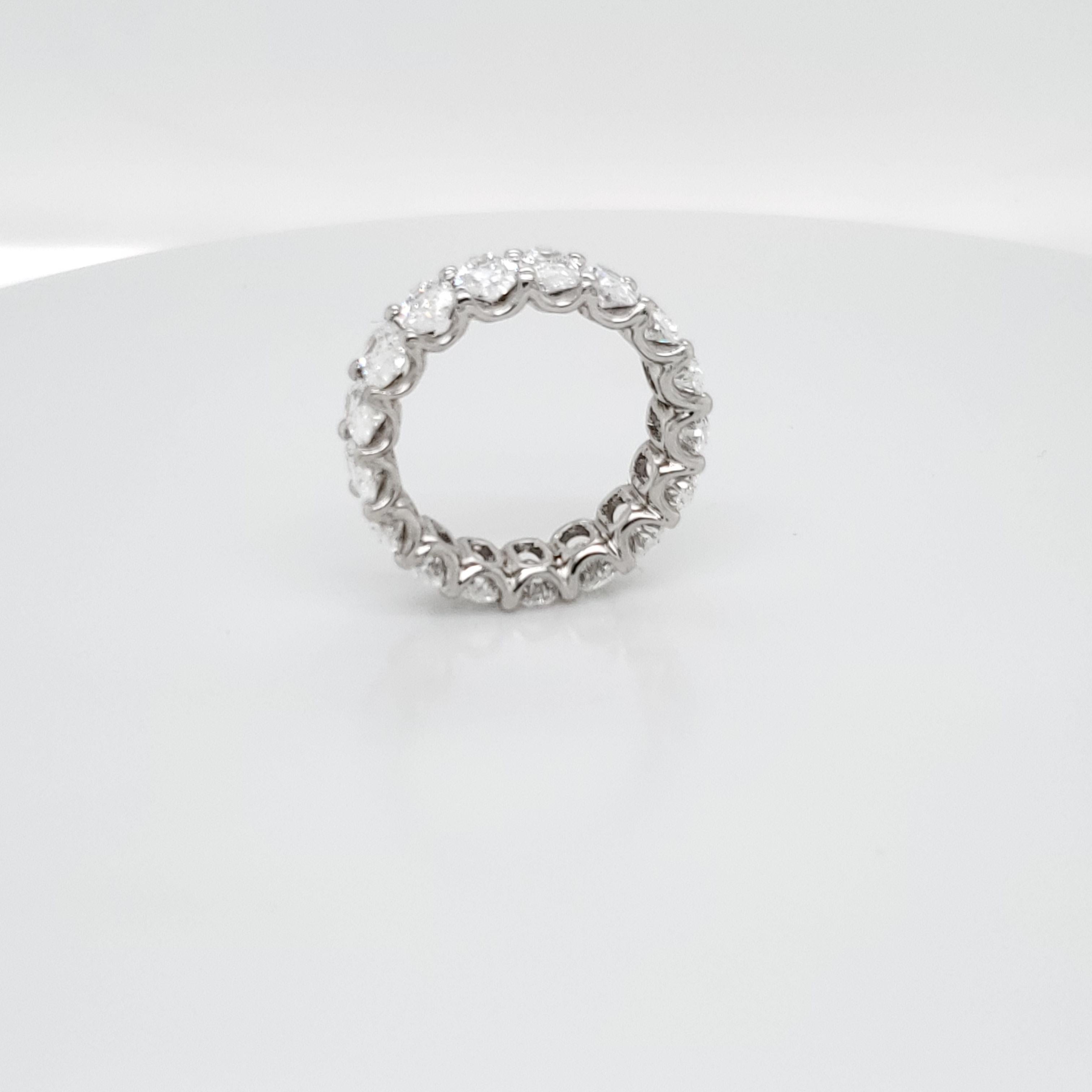 oval cut eternity band with 17 ovals weighing 5.87 carats. Average color is F and VVS quality. 
