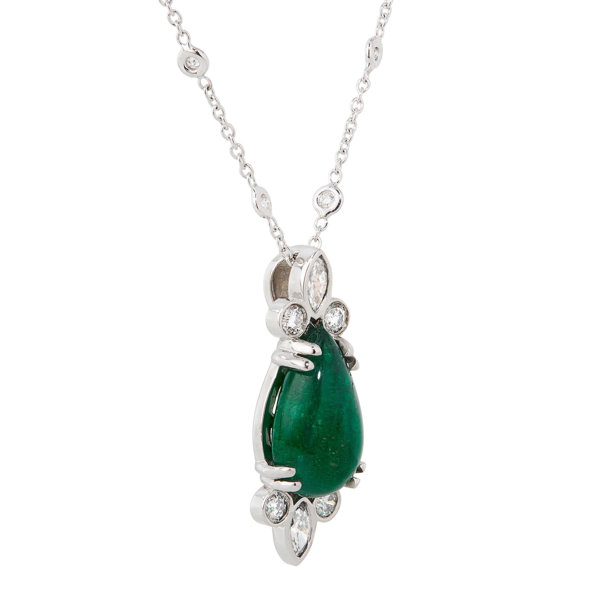 This set of smooth Cabochon Zambian Emeralds accented by diamonds is classic. Suitable for any occasion.

Pendant Measurements
Height 26.53 mm
Width 9.30 mm

Pendant Detail
Pear-shaped Emerald Cabochon 4.71 Carats
8 Diamonds 0.84 Carats
Set in