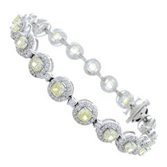 5.88 Carat Total Cushion Cut Fancy Yellow Diamond Bracelet in 18 Karat Gold