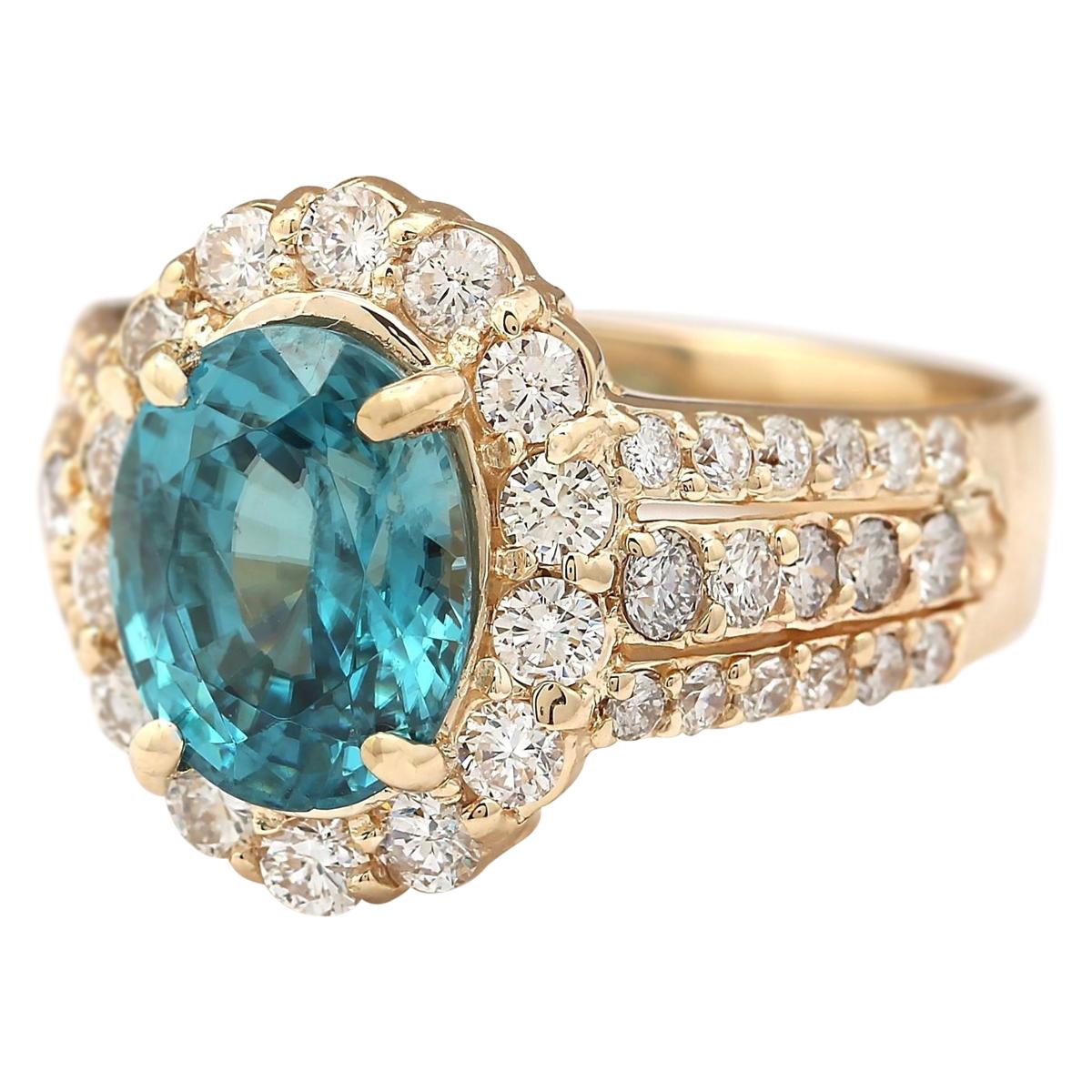 Stamped: 14K Yellow Gold
Total Ring Weight: 9.3 Grams
Total Natural Zircon Weight is 4.39 Carat (Measures: 10.00x8.00 mm)
Color: Blue
Total Natural Diamond Weight is 1.50 Carat
Color: F-G, Clarity: VS2-SI1
Face Measures: 15.50x12.85 mm
Sku: [704010W]