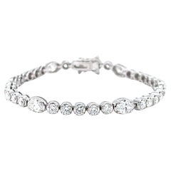 Bracelet en or blanc 18 carats avec diamants naturels ovales et ronds de 5,89 carats