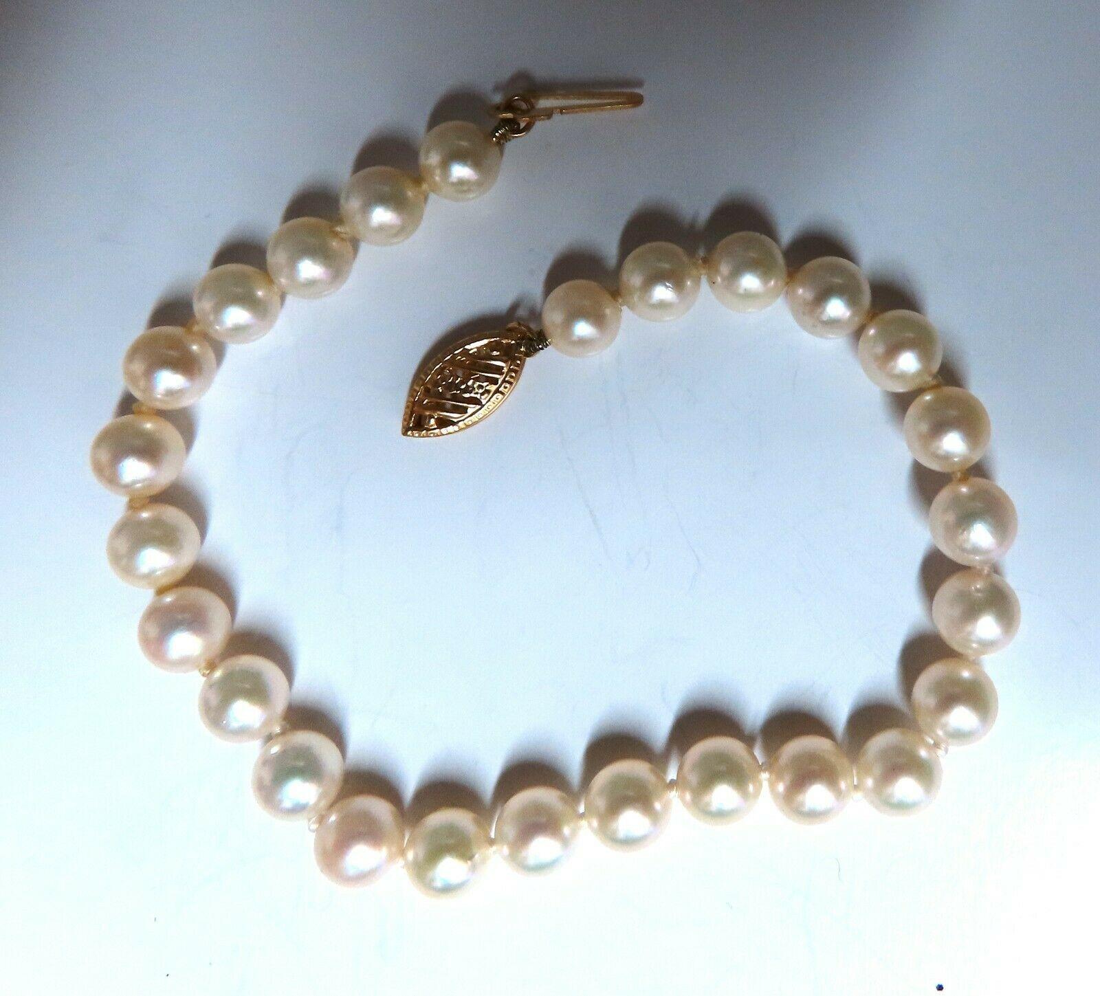 5.8 mm Akoya pearls bracelet.

14 karat yellow gold

7 in Long