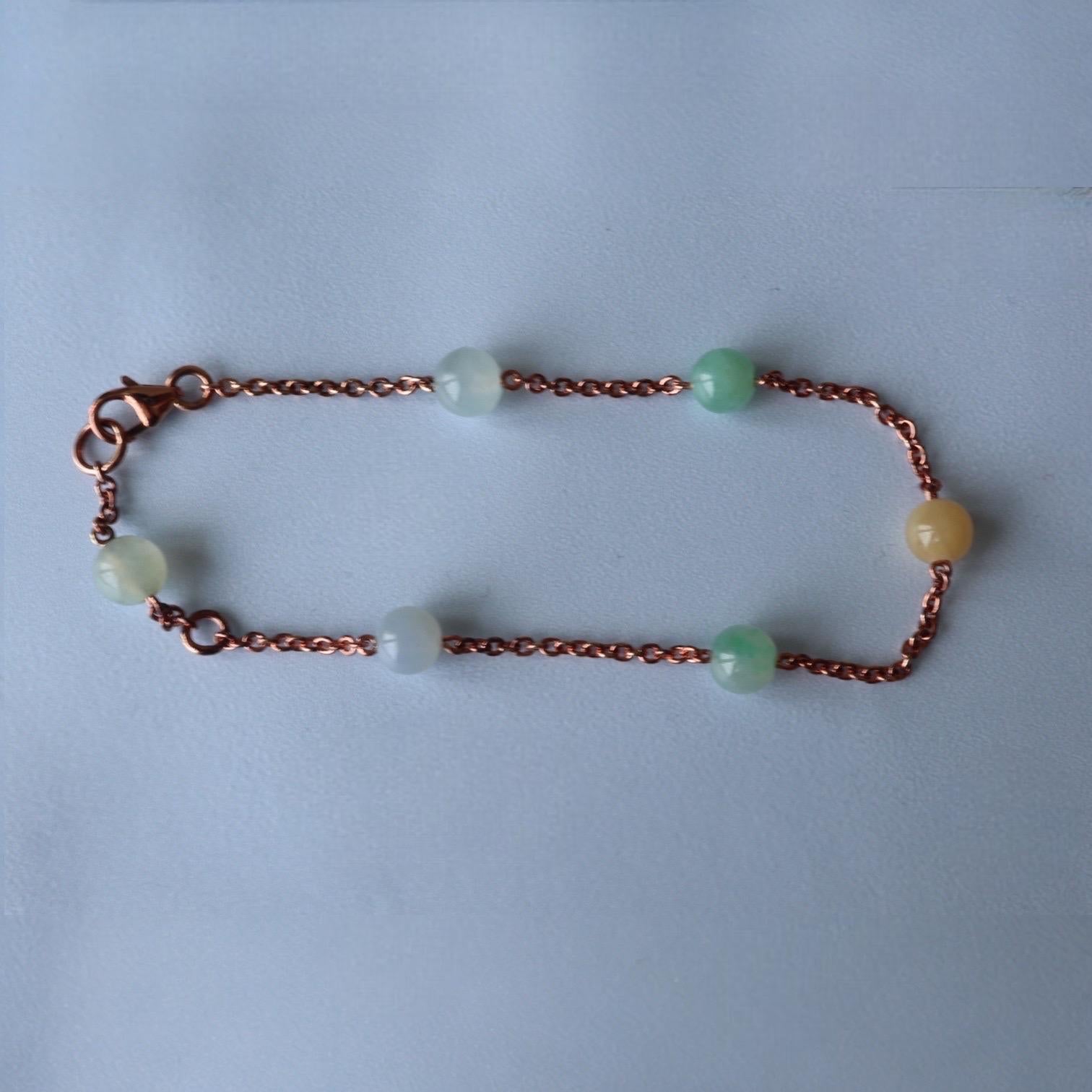 Burmese Type A Jadeite Jade bracelet

Features :

Main Gemstone (6pcs) - Burmese Type A Jade

Total Carat Weight (6pcs) - 9.6Ct (approx)

Bead Size - 5.8mm

Color- Multi Color

Translucency - Translucent

Treatment - None (No Heated, No Treated, Not