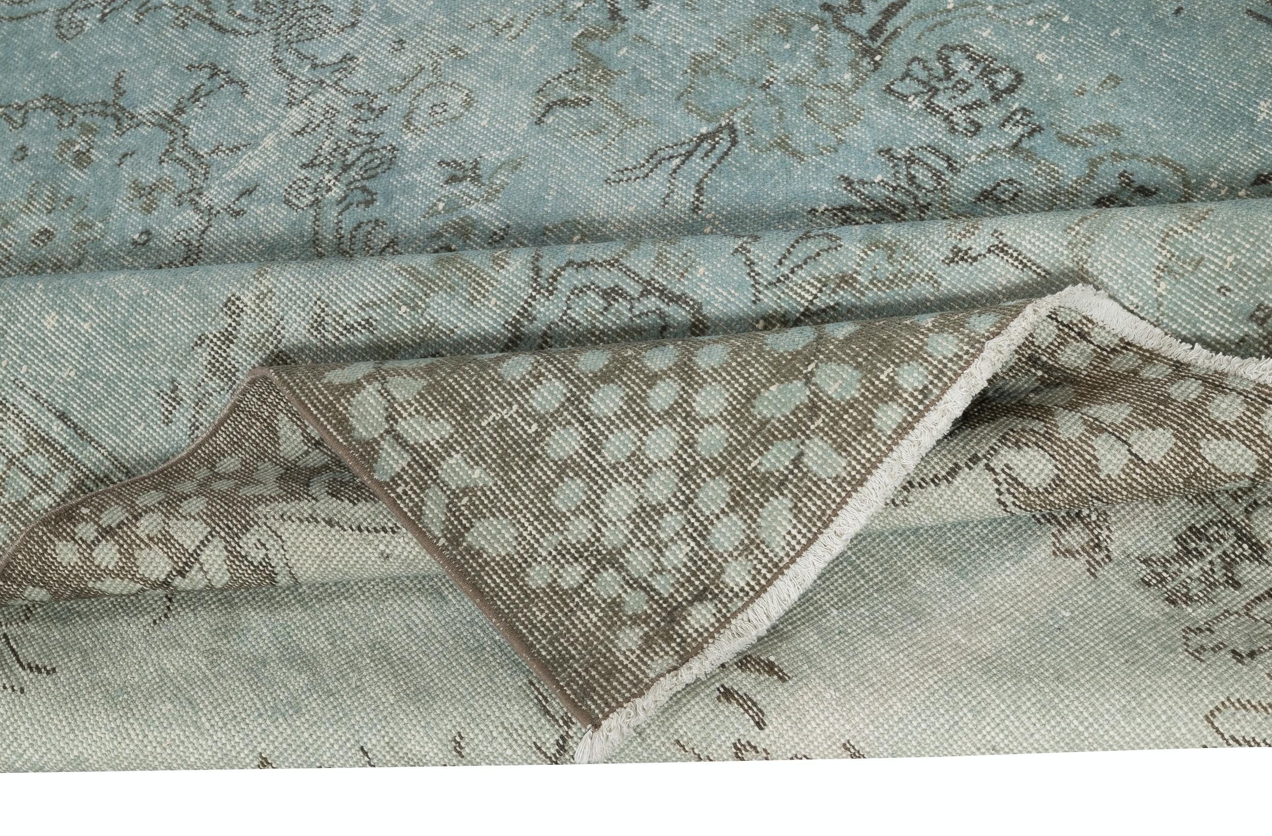Modern 5.8x10 Ft Hand Knotted Light Blue Color Area Rug with Medallion Design For Sale