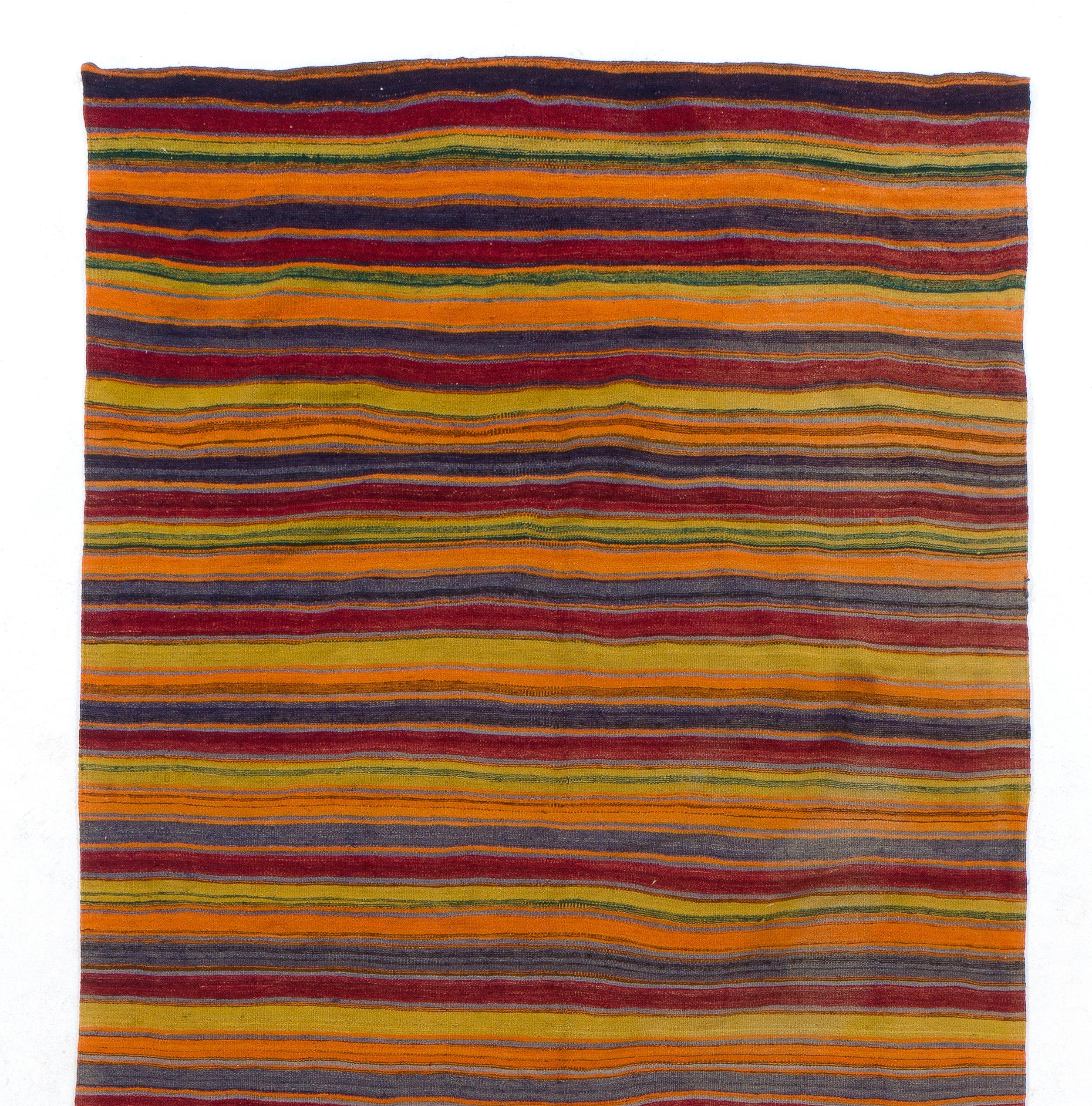 Vintage handwoven flat-weave (Kilim) with striped design, 100% wool. Measures: 5.8 x 12.7 ft.
We can modify the dimensions if requested, i.e. make it shorter and/or narrower.
Reversible; both sides can be used.
Ideal for both residential and