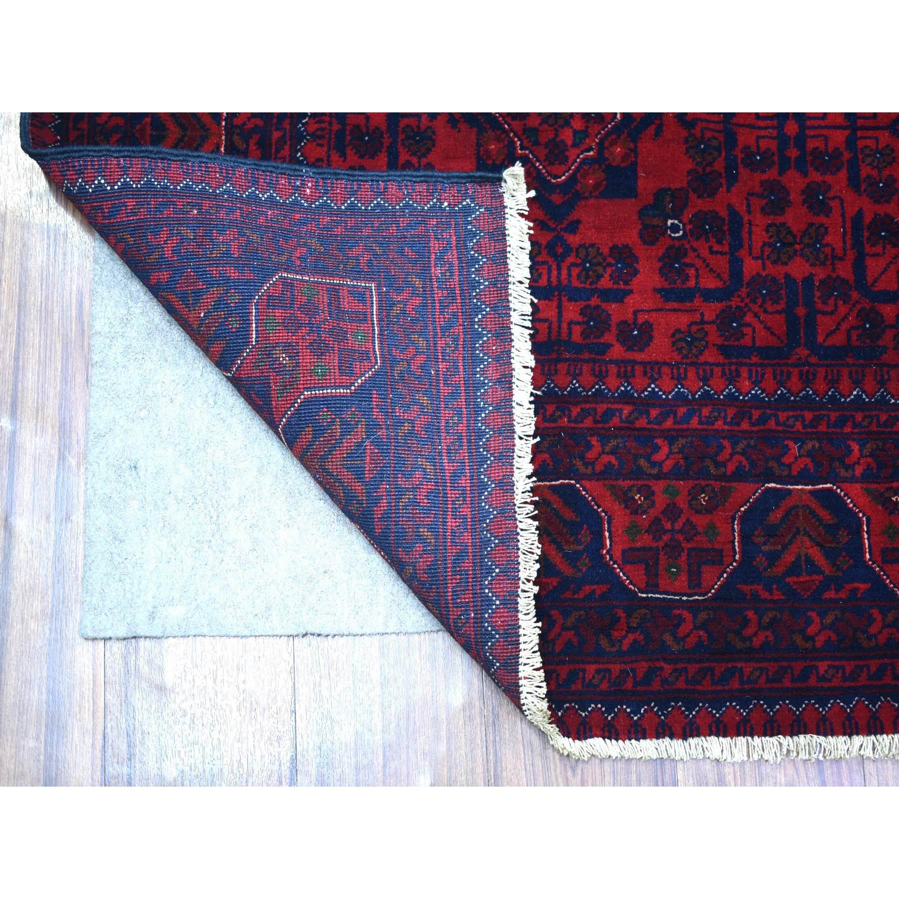 This is a truly genuine one-of-a-kind Deep and Saturated Red with Touches of Blue, Hand Knotted Afghan Khamyab with Geometric Design, Soft and Velvety Wool, Oriental Rug. It has been Knotted for months and months in the centuries-old weaving