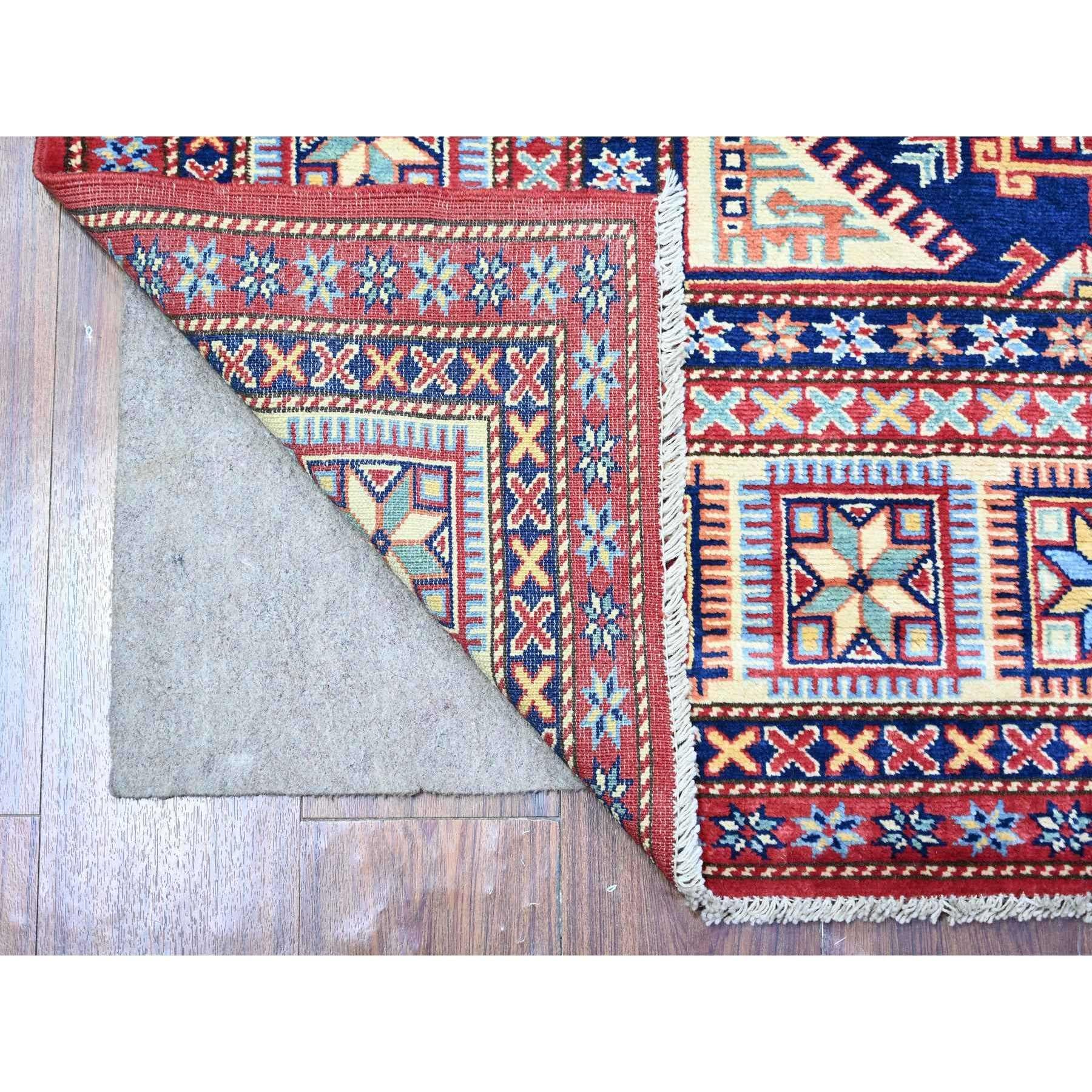 This is a truly genuine one-of-a-kind Afghan Super Kazak with Medallions Hand Knotted, Oriental Rug. It has been Knotted for months and months in the centuries-old weaving craftsmanship techniques by expert artisans.
Primary materials: Wool
Latex: