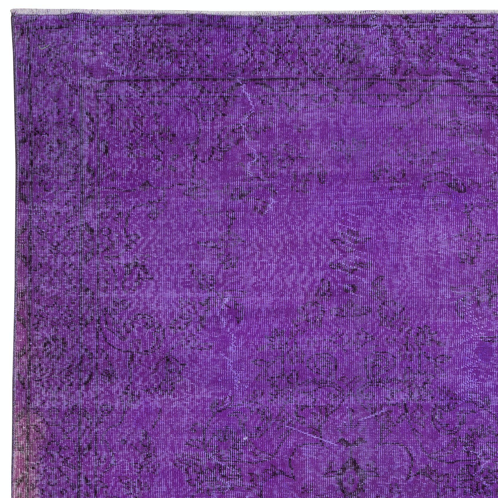 Elevate your living space with the exquisite beauty of this Handmade Turkish Rug, meticulously crafted and over-dyed in a captivating shade of Purple. Embracing the rich heritage of Turkish weaving tradition, this rug seamlessly blends traditional