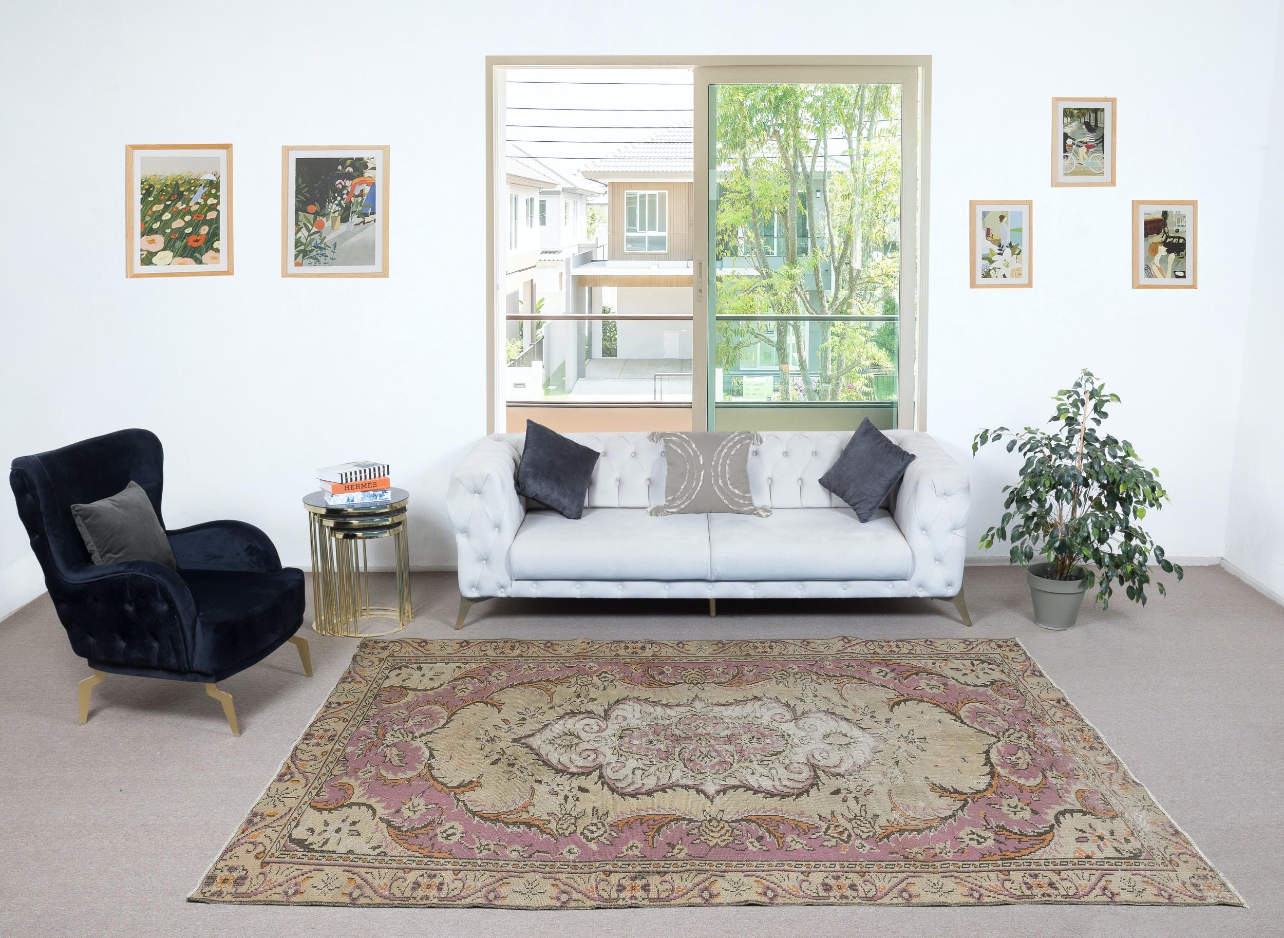 Infuse your home with the timeless beauty of this traditional vintage handmade Turkish rug, a hand-knotted masterpiece crafted from a luxurious blend of wool and cotton. Woven by skilled artisans using centuries-old techniques, this rug features
