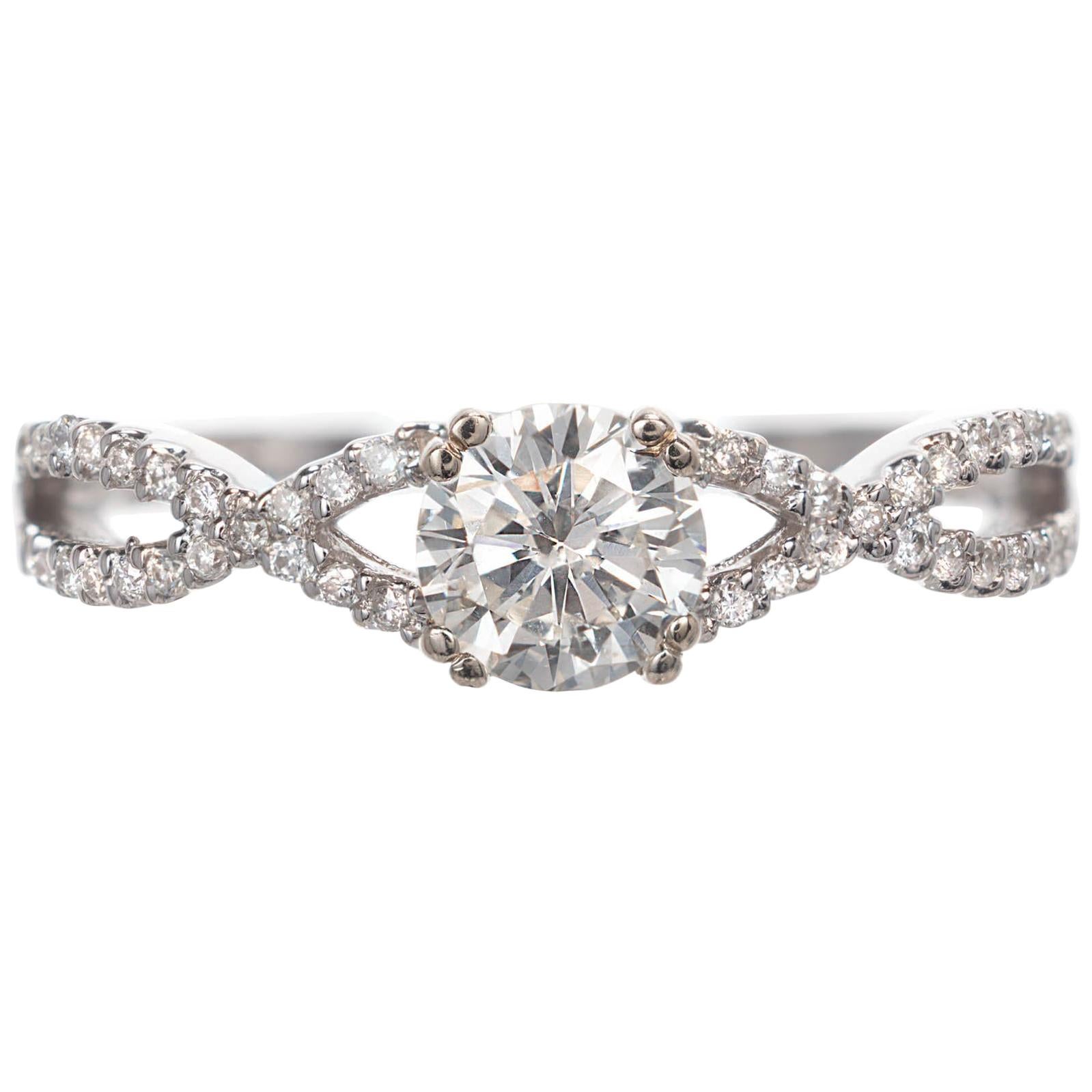 .59 Carat Diamond Swirl Infinity White Gold Diamond Engagement Ring For Sale