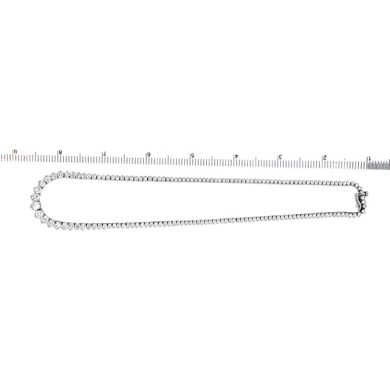 This gorgeous necklace has over 200 diamonds from end to end. The central point is a 4mm diamond, gradually decreasing to 1.8mm at the back clasp. The total diamond weight is 5.9 carats. Set in 14k White Gold.
Suggested retail price: