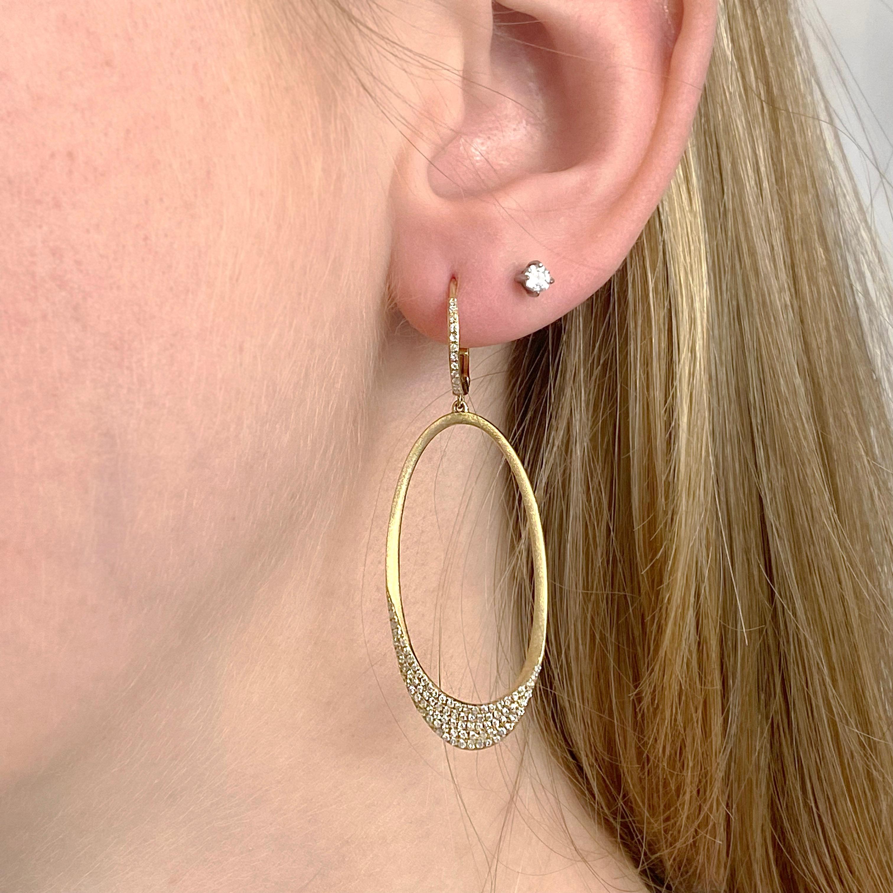 These beautiful dangle earrings are covered in round brilliant excellent diamonds, giving these classy dangles some sparkle. The details for this beautiful necklace are listed below:
Metal Quality: 14K Yellow Gold 
Earring Type: Lever 
Diamond