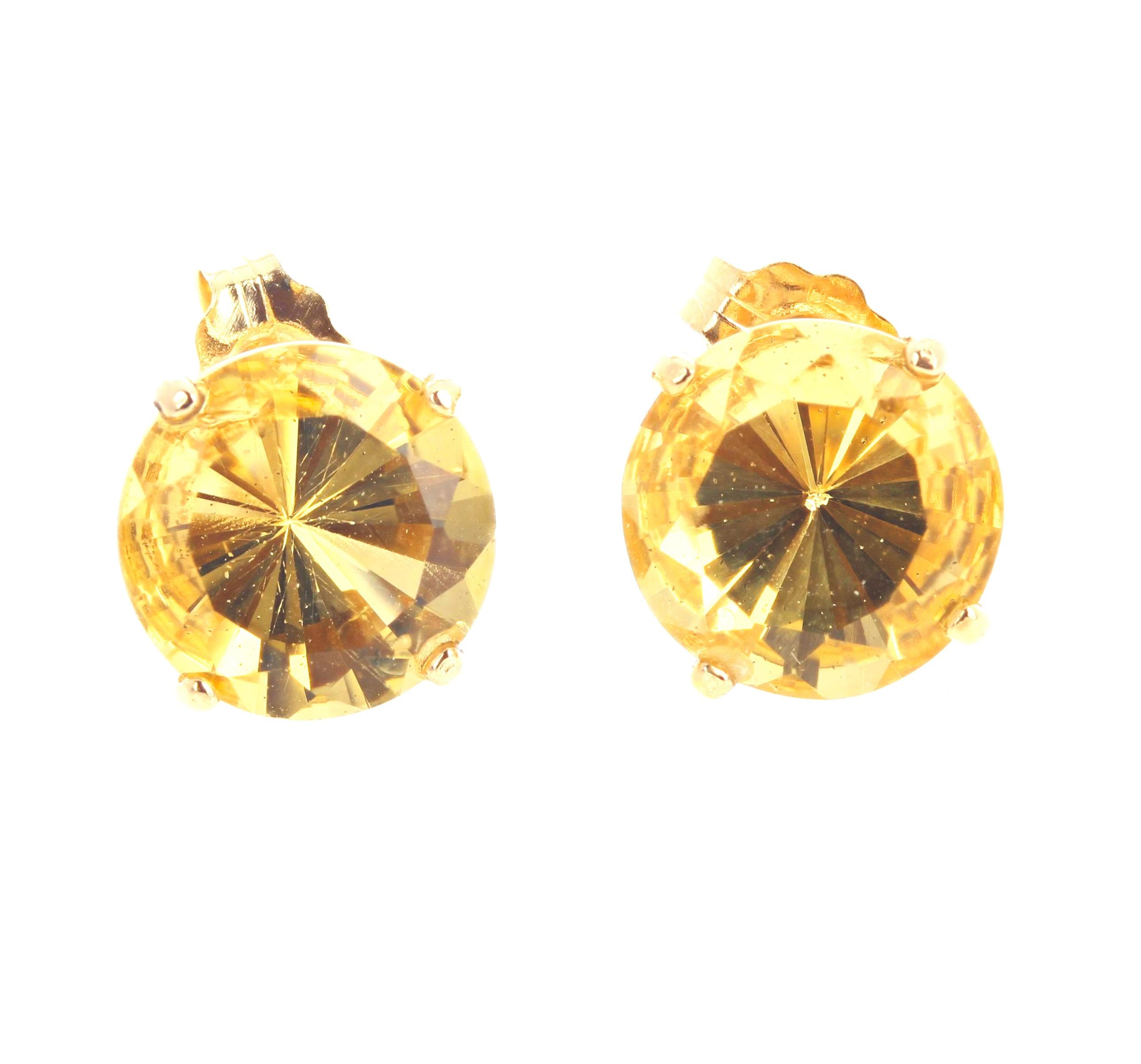 These gorgeous glittering (9 mm and 2.9 carats each) natural yellow Beryl gemstones are set in 14Kt yellow gold stud earrings.  