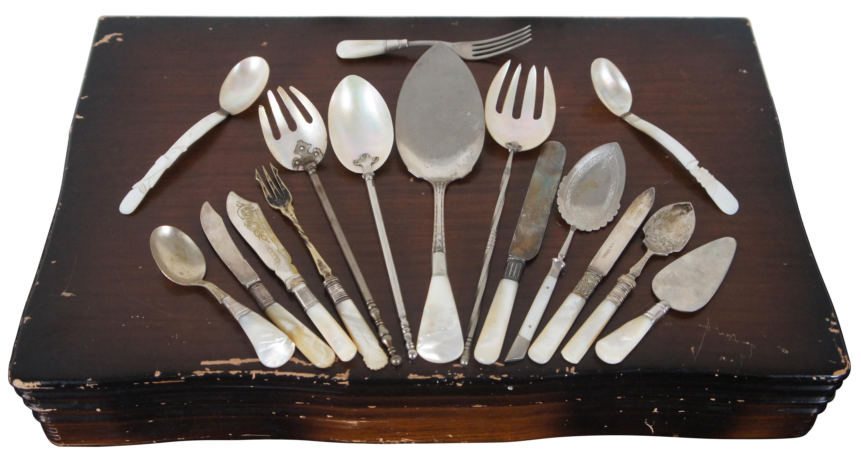 59 piece sterling silver and mother of pearl flatware set and wood chest, primarily by Landers, Frary & Clark with additional assorted pieces.

Measures: Chest - 20” x 12.5” x 3.5” / 12 LF&C sterling table knives - 9.5” x 0.875” - 54.5 g / 12 LF&C