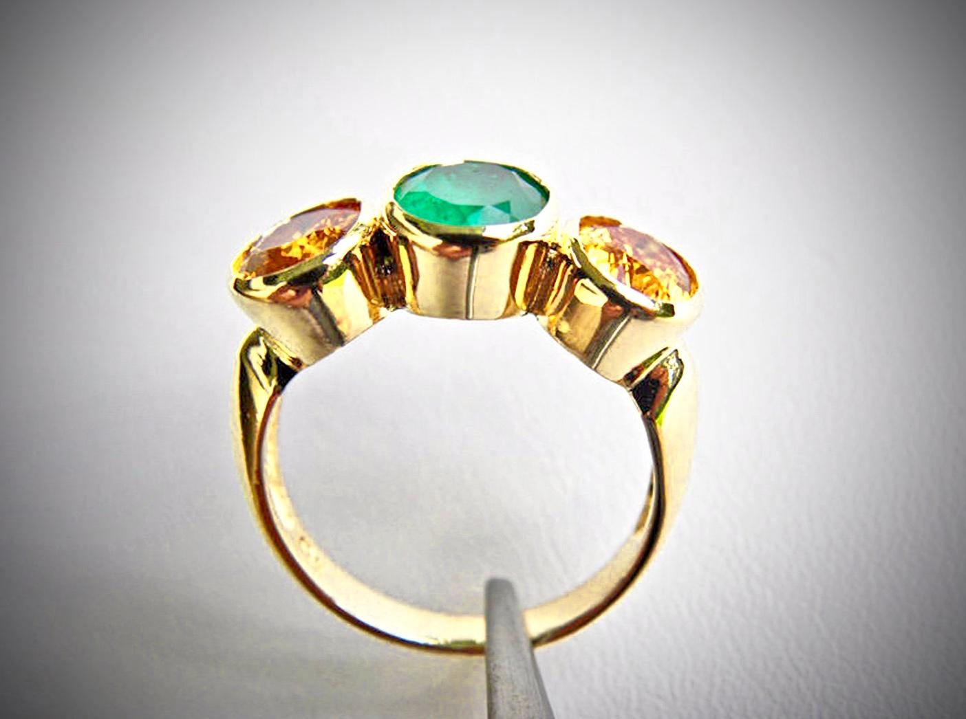 Women's Emerald Yellow Sapphire Three Stone Ring 18 Karat Yellow Gold For Sale