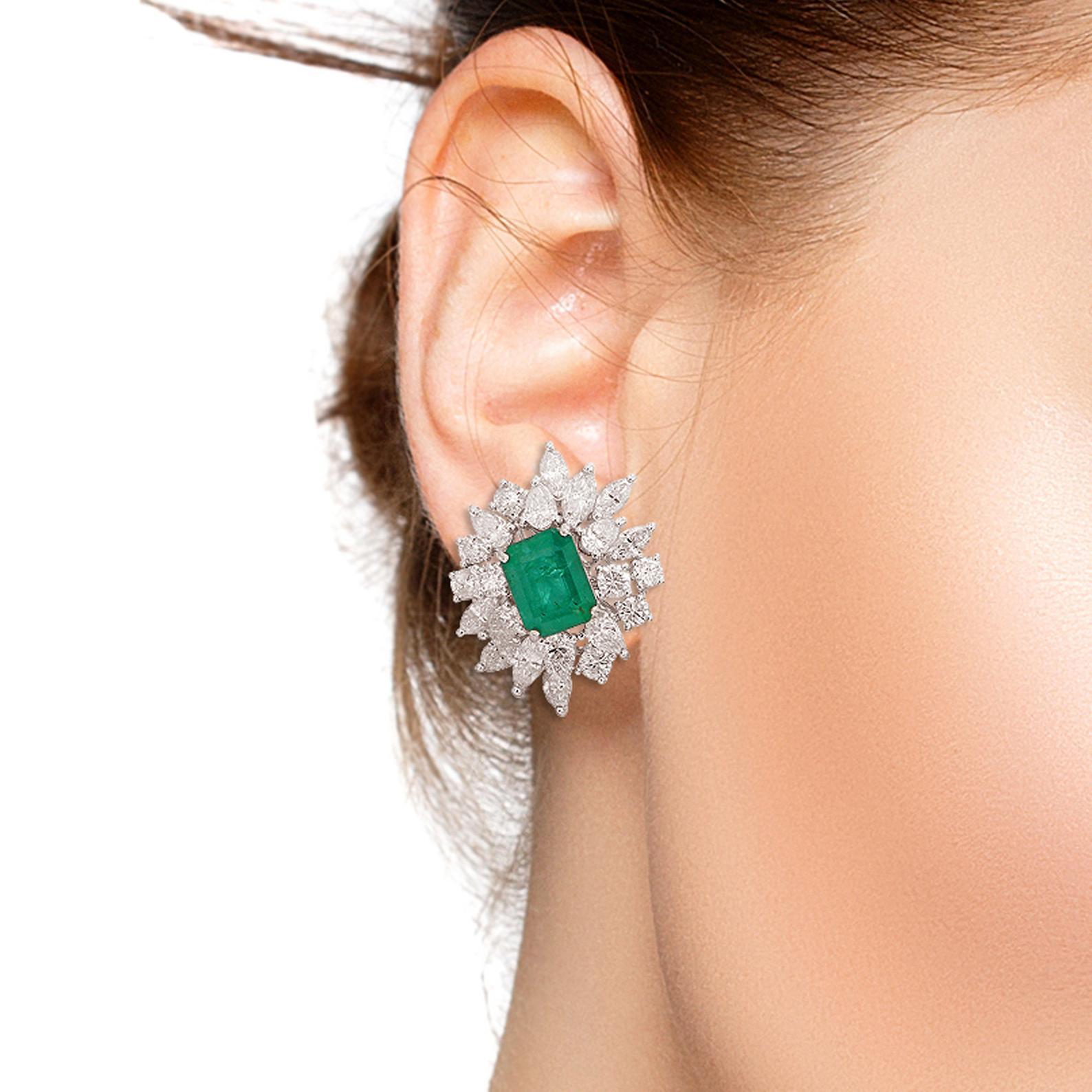 Cast in 14 karat white gold, these stunning stud earrings are hand set with emerald and 5.90 carats of glimmering diamonds. 

FOLLOW MEGHNA JEWELS storefront to view the latest collection & exclusive pieces. Meghna Jewels is proudly rated as a Top
