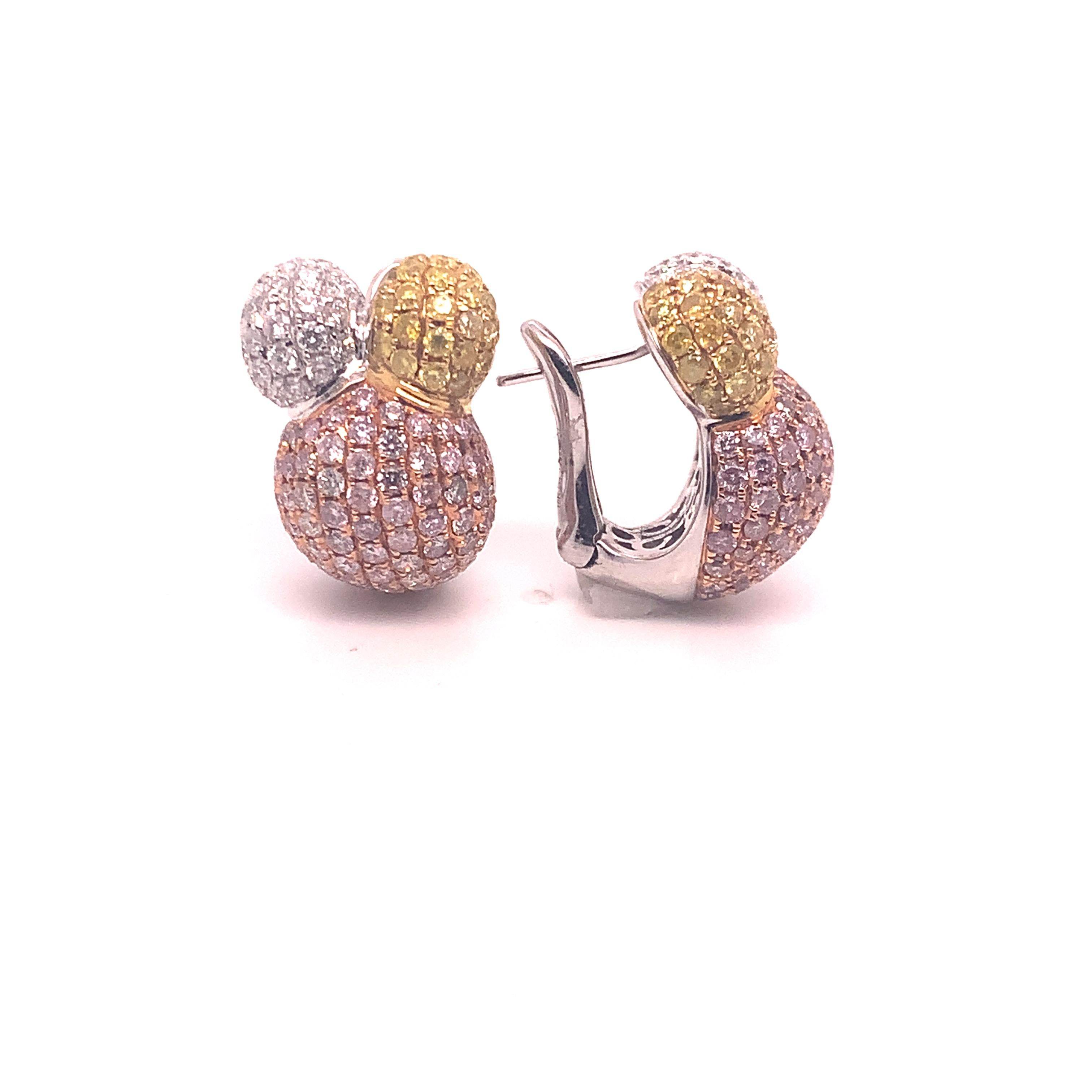5.90 Carats of Sparkling Natural Fancy Colored Pink and Yellow Diamond Earrings
Total Diamond Weight: 5.90 Carat
Natural Fancy Pink Diamonds: 3.30 Carats (total 164 stones)
Natural Fancy Yellow Diamonds: 1.36 Carats (total 58 stones)
White Diamonds: