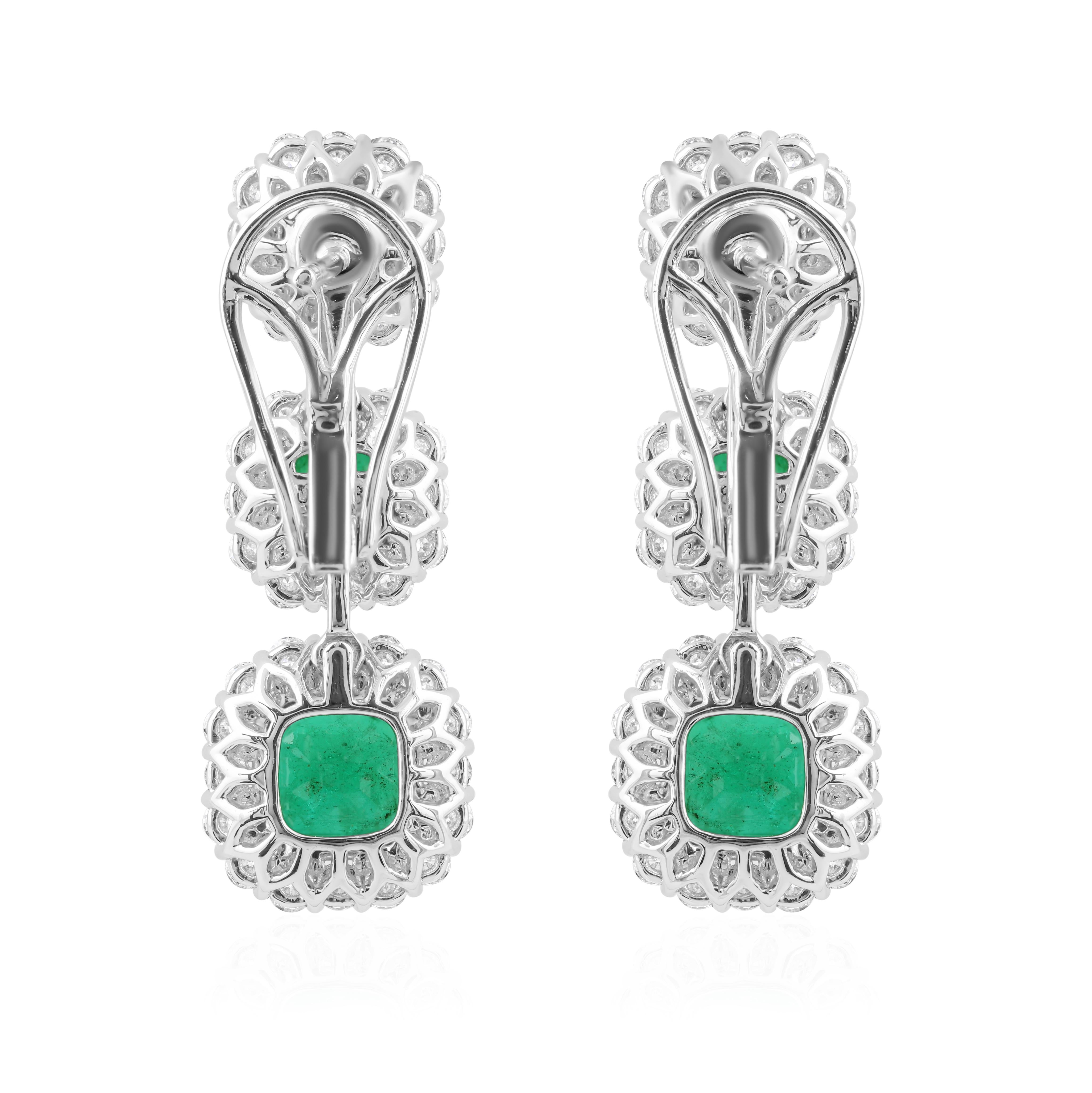 Cast from 18-karat gold, these exquisite earrings are handset with 5.90 carats Zambian emerald and 1.82 carats of sparkling diamonds.

FOLLOW SPECTRUM JEWELS storefront to view the latest collection & exclusive pieces. Spectrum Jewels is proudly
