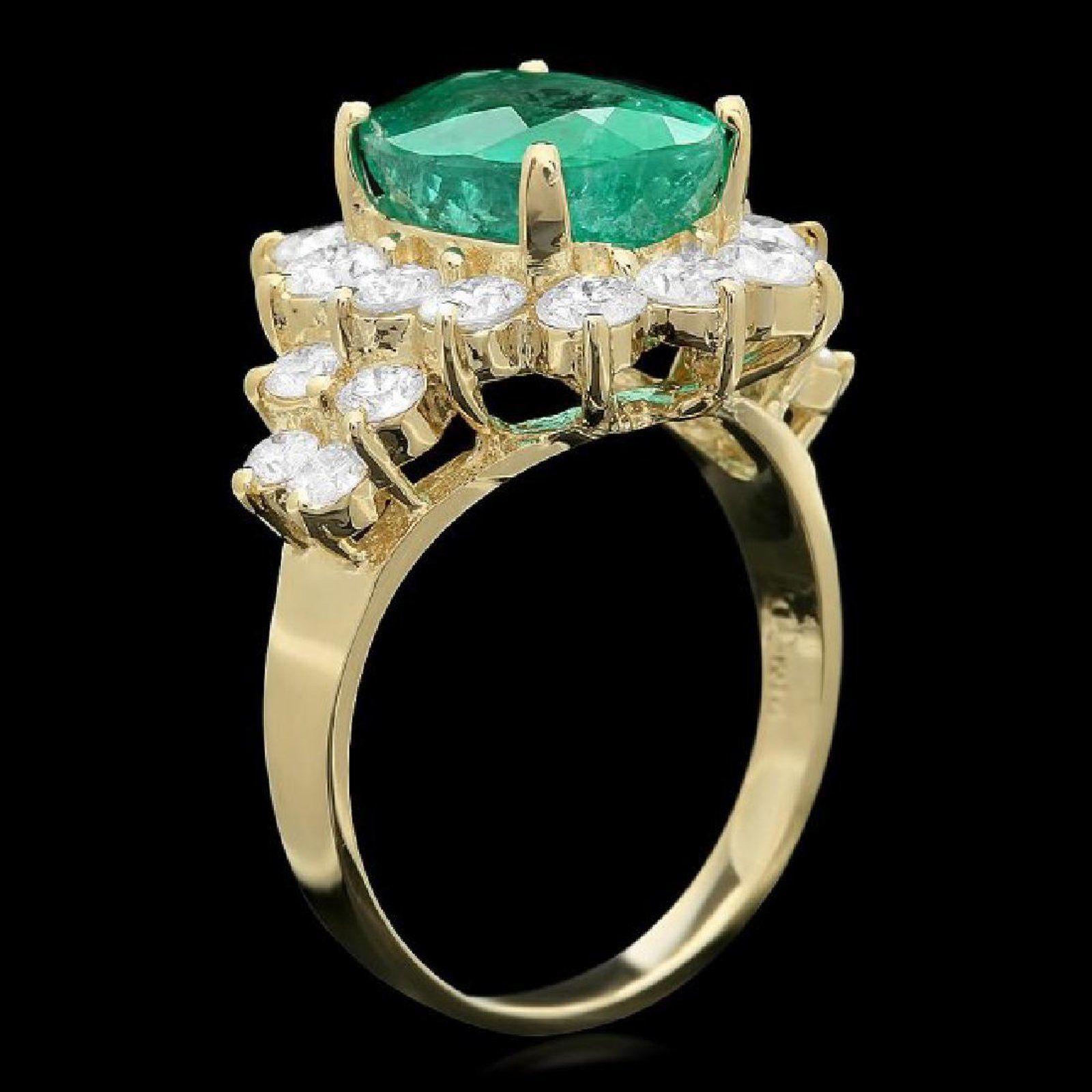 5.90 Carats Natural Emerald and Diamond 14K Solid Yellow Gold Ring

Total Natural Green Emerald Weight is: 4.20 Carats

Emerald Measures: 12.00 x 9.00mm

Natural Round Diamonds Weight: 1.70 Carats (color G-H / Clarity SI1-SI2)

Ring size: 7 (we