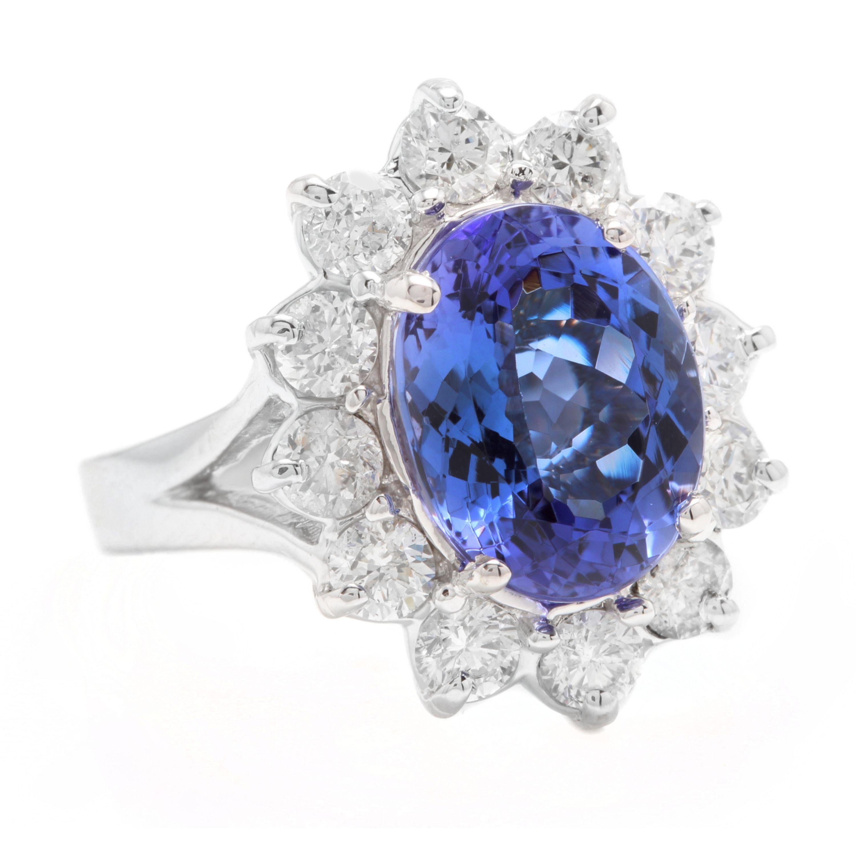 5.90 Carats Natural Very Nice Looking Tanzanite and Diamond 14K Solid White Gold Ring

Total Natural Oval Cut Tanzanite Weight is: 4.00 Carats

Natural Round Diamonds Weight: 1.90 Carats (color G-H / Clarity SI1-SI2)

Ring size: 5.5 (we offer free
