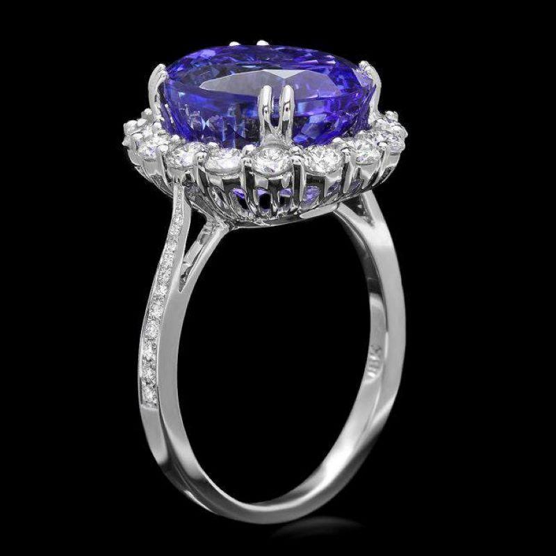 5.90 Carats Natural Tanzanite and Diamond 18K Solid White Gold Ring

Total Natural Oval Cut Tanzanite Weight is: Approx. 5.00 Carats 

Tanzanite Measures: Approx. 12 x 10mm
 
Natural Round Diamonds Weight: Approx. 0.90 Carats (color G-H / Clarity