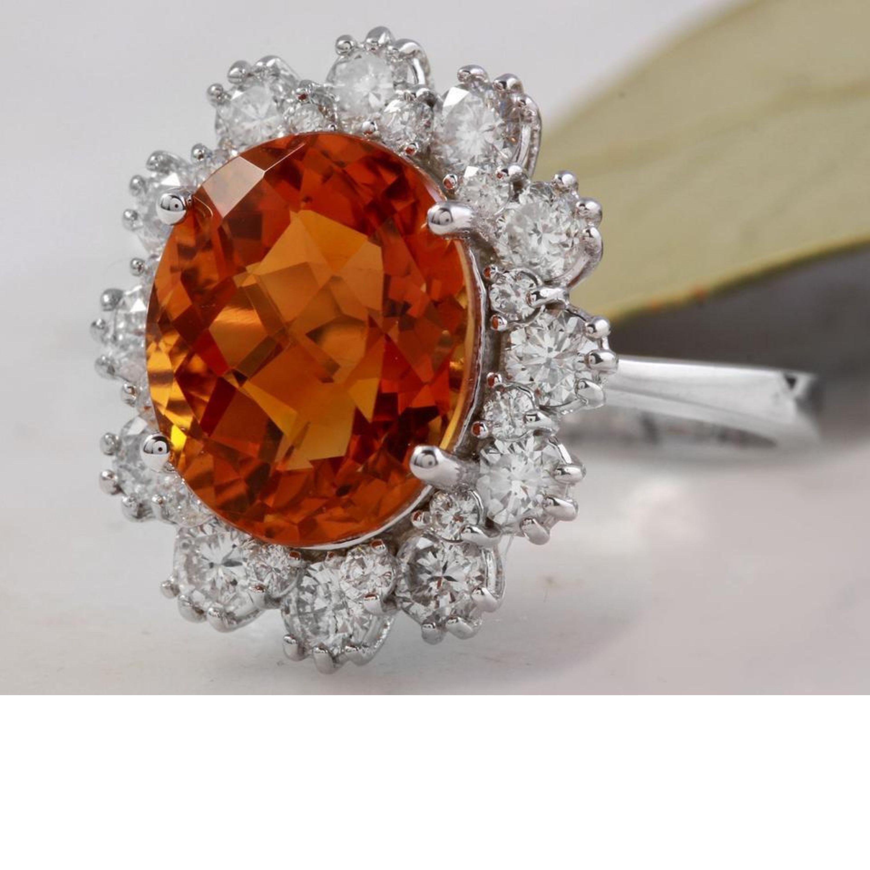 5.90 Carats Exquisite Natural Madeira Citrine and Diamond 14K Solid White Gold Ring

Total Natural Citrine Weights: 4.60 Carats

Citrine Measures: 12 x 10mm

Natural Round Diamonds Weight: 1.30 Carats (color G-H / Clarity Si1-SI2)

Ring size: 7 (we