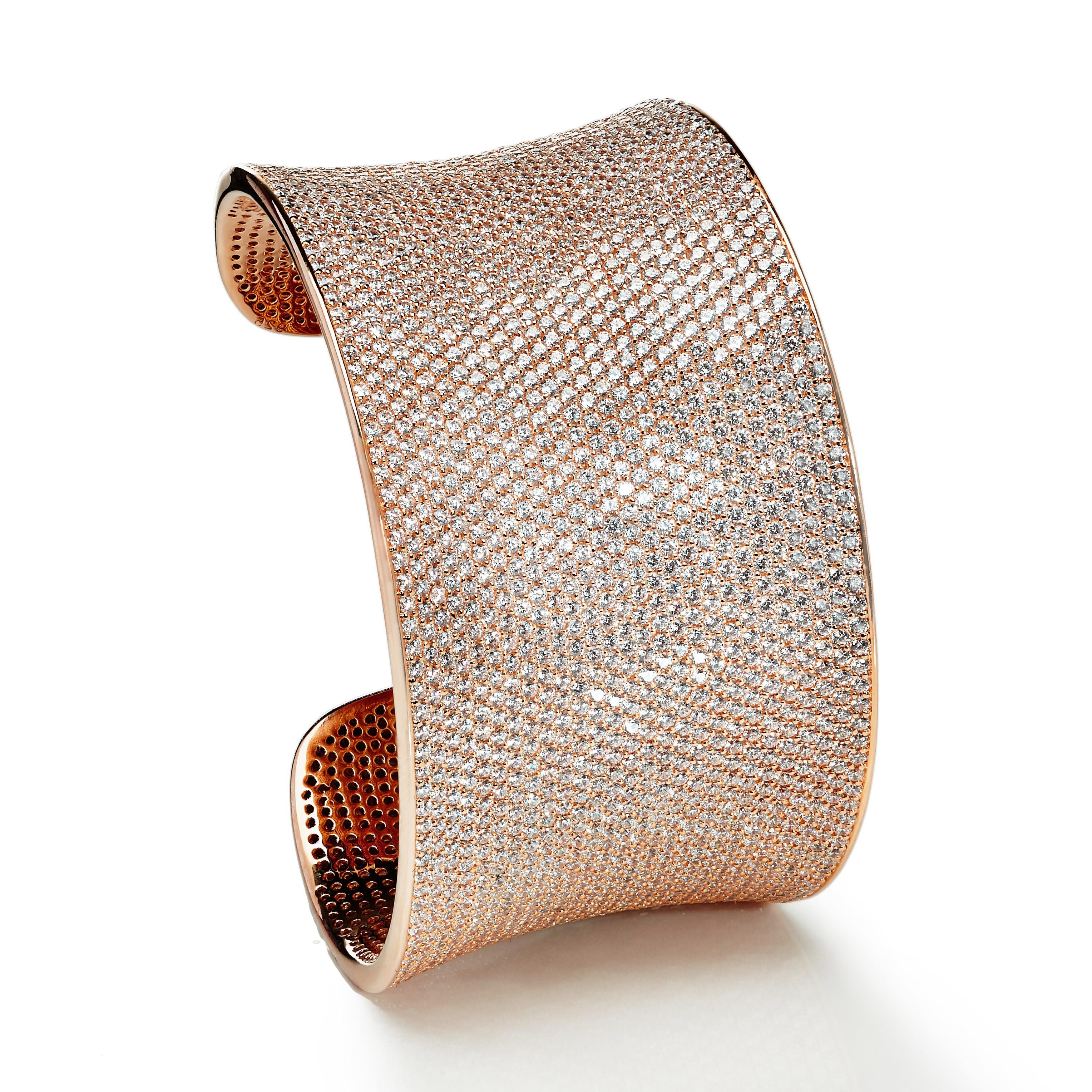 This spectacular micro-set cuff bangle is a guaranteed show stopper.

As our signature piece, it represents the collection’s style and uniqueness.

Encrusted with over 2,500 of the highest quality brilliant cut cubic zirconia, this statement bangle