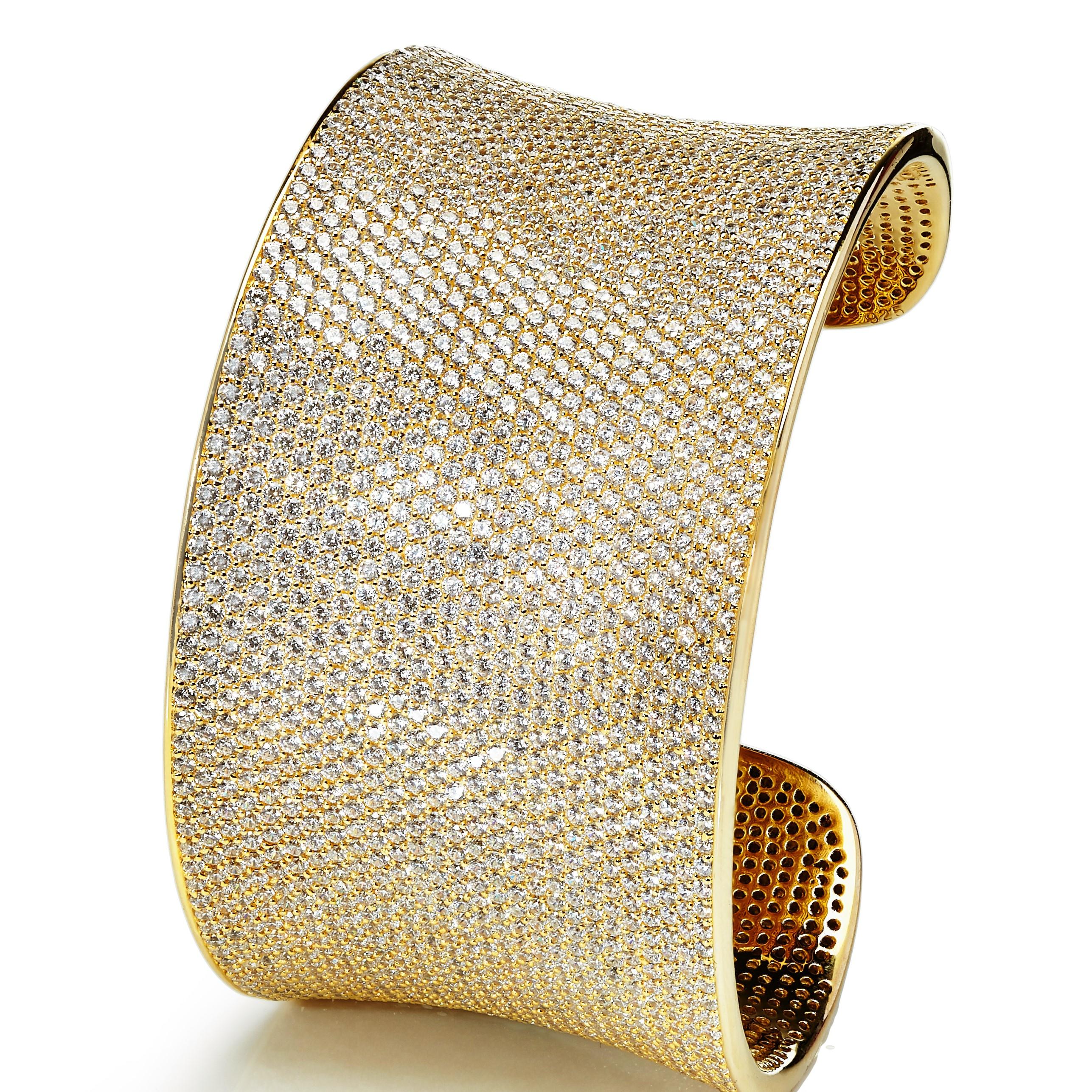 This spectacular micro-set cuff bangle is a guaranteed show stopper.

As our signature piece, it represents the collection’s style and uniqueness.

Encrusted with over 2,500 of the highest quality brilliant cut cubic zirconia, this statement bangle