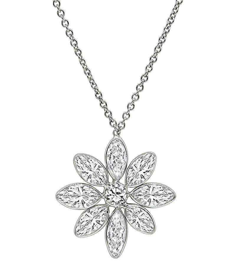 This is an amazing 14k white gold pendant necklace. The pendant is set with sparkling marquise and round cut diamonds that weigh approximately 5.90ct. The color of these diamonds is H-J with VS clarity. The pendant measures 27mm by 24mm and the