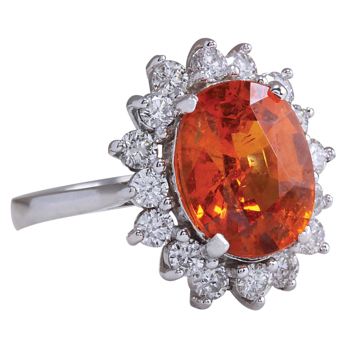 Stamped: 18K White Gold<br>Total Ring Weight: 4.8 Grams<br>Ring Length: N/A<br>Ring Width: N/A<br>Gemstone Weight: Total Natural Mandarin Garnet Weight is 5.01 Carat (Measures: 11.30x8.92 mm)<br>Color: Orange<br>Diamond Weight: Total Natural Diamond