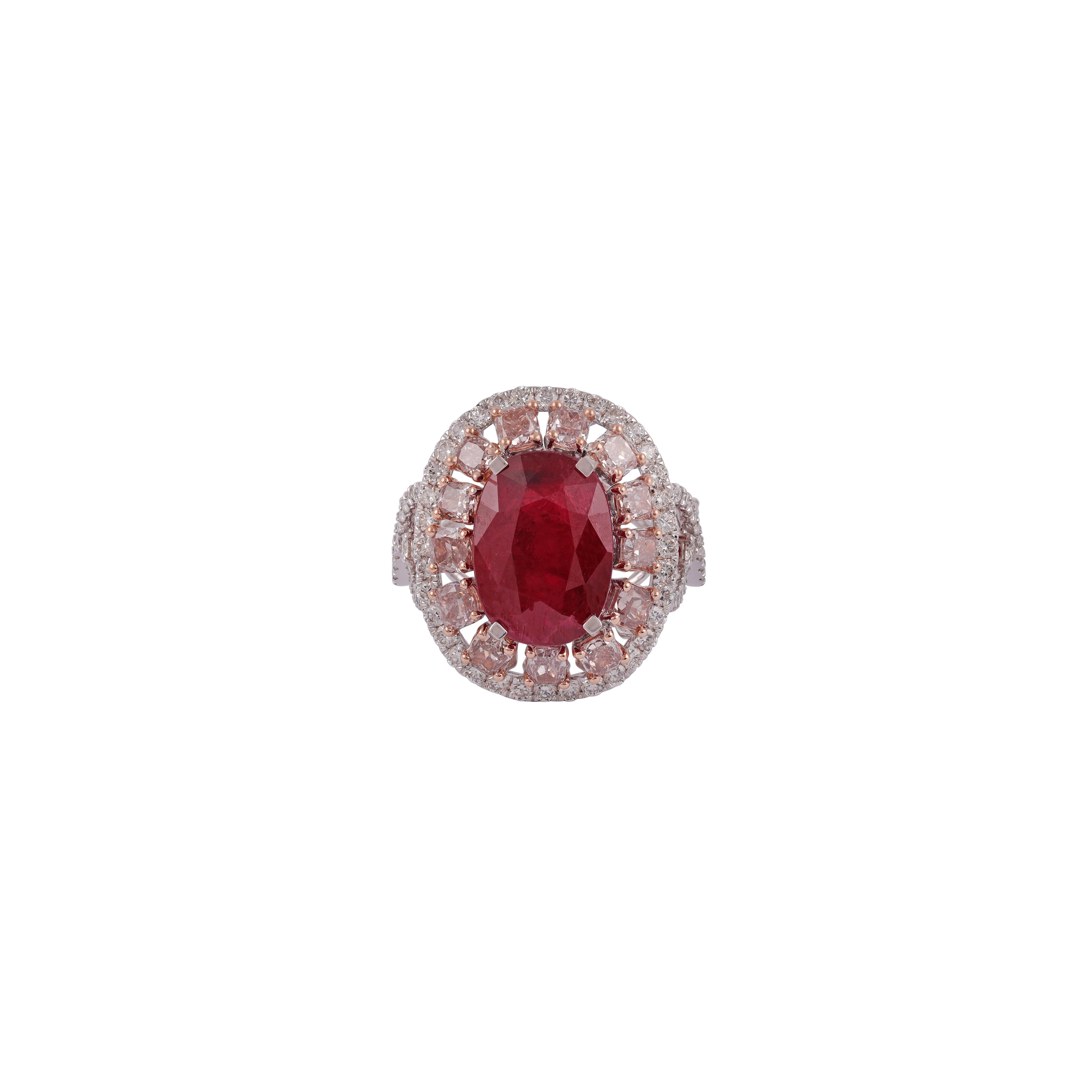 Apart of our carefully curated collection, this ring proudly displays a 5.91 carat High value Clear  Mozambique ruby crowning a 18k White Gold Ring. The ruby's prongs hold the stone tightly but allow it to be seen in its entirety. The center stone