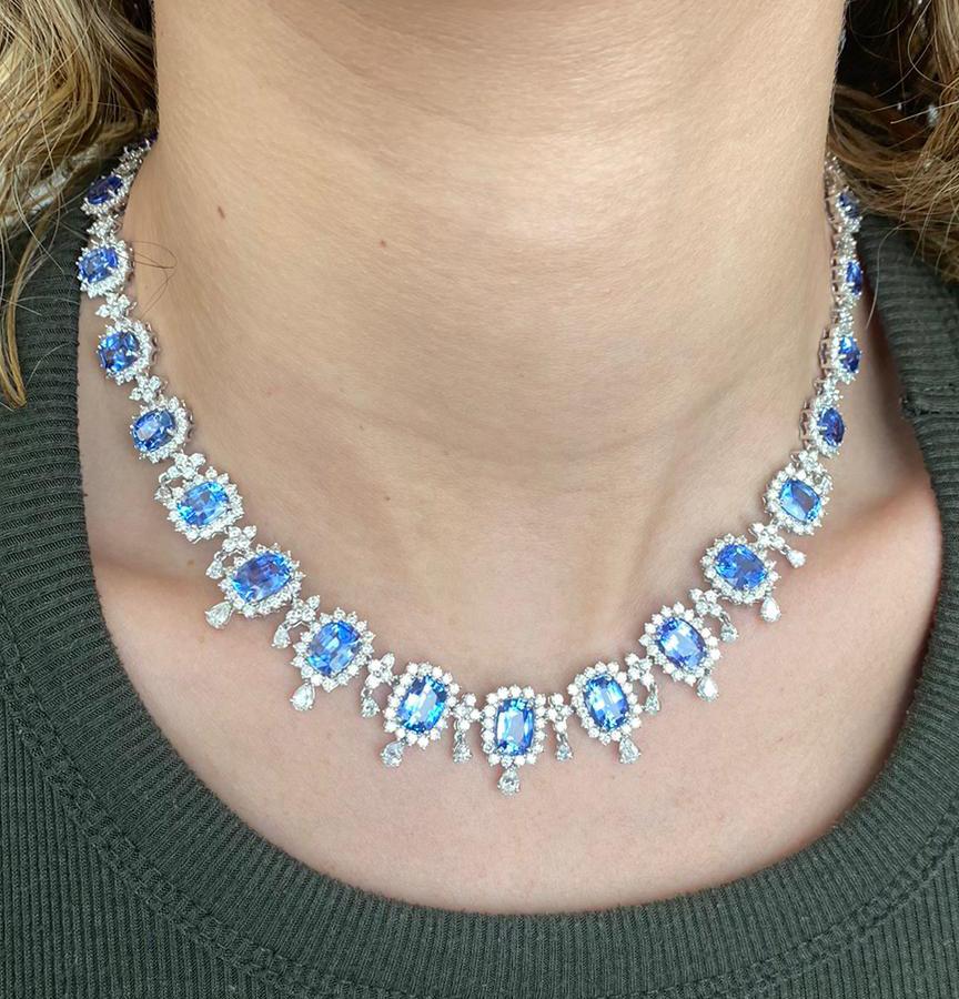 Sensational diamond necklace finely crafted in 18 karat white gold, featuring blue corn flower Ceylon Sapphires and white diamonds weighing approximately 59.15 carats total. This exceptional necklace showcases a mix of round brilliant cut diamonds