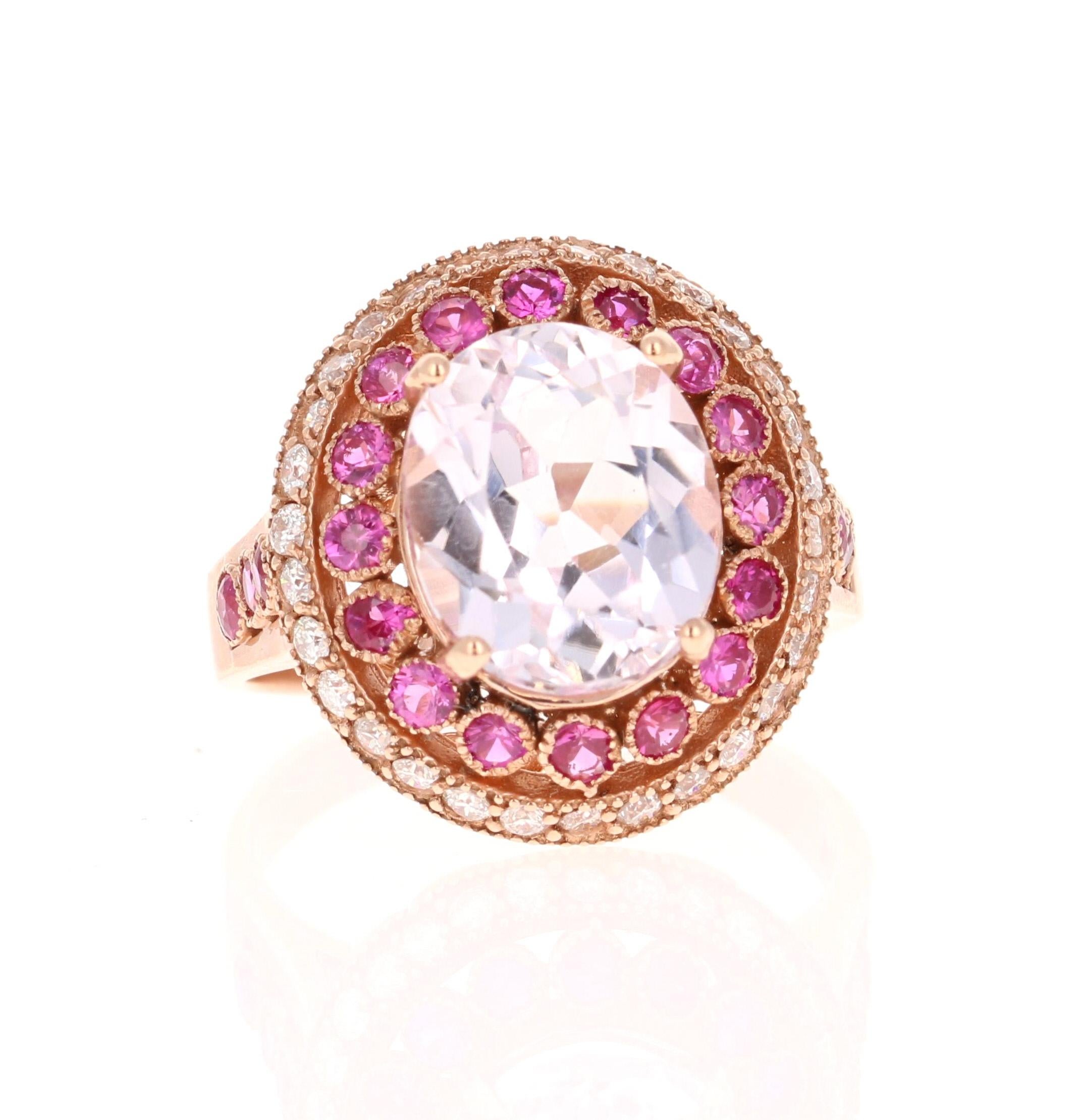 5.92 Carat Kunzite Pink Sapphire Diamond 14 Karat Rose Gold Ring

This beautiful ring has an Oval Cut 4.53 Carat Kunzite that is set in the center of the ring and is surrounded by 22 Round Cut Pink Sapphires that weigh 0.93 Carats. Additionally