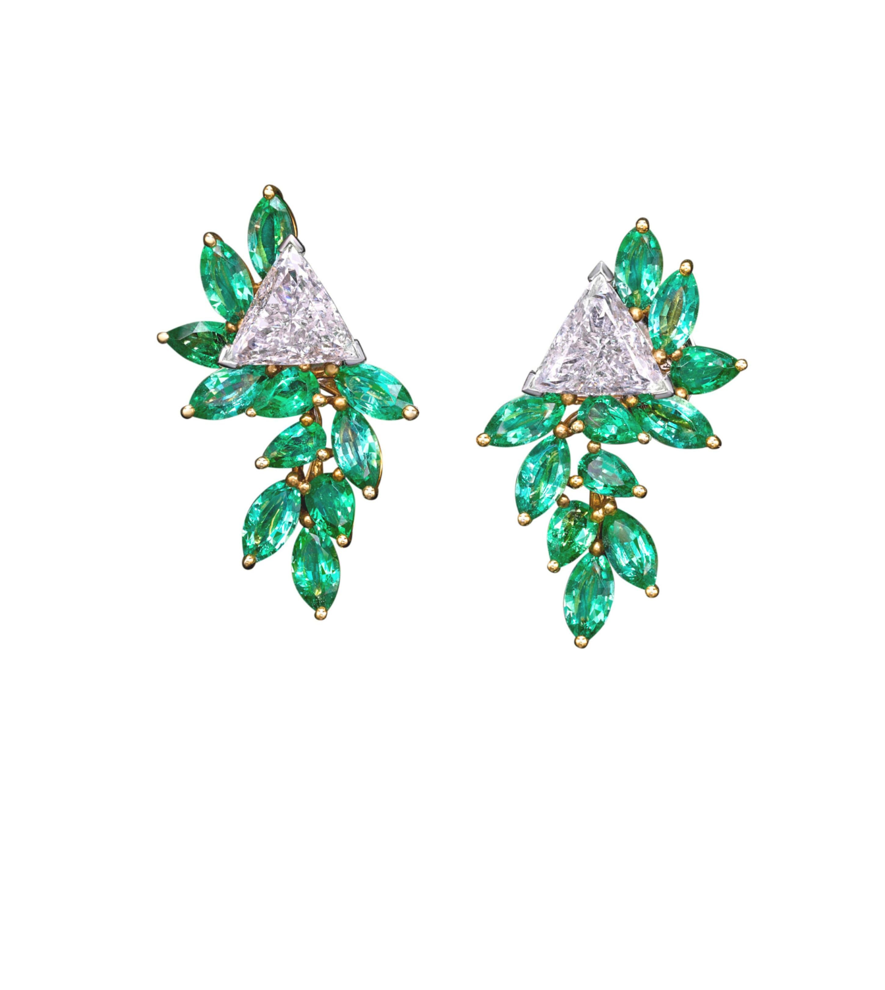 Featuring a pair of radiant triangle-cut diamonds—one weighing 1.04 carats and the other 1.07 carats—they showcase remarkable brilliance and captivating charm.

Enhancing the allure of the triangle-cut diamonds, a stunning collection of princess-cut