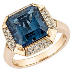 5.93 Carat London Blue Topaz Fancy Ring in 18KRG with White Diamond.