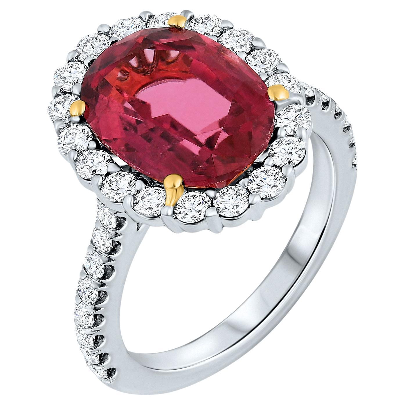 5.93 Carat Red Tourmaline & Diamond Halo Cocktail Ring, set in 18K Gold. For Sale
