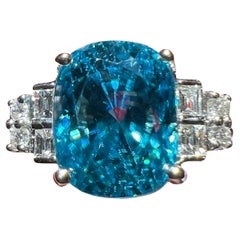 5.93 carats natural blue zircon ring, calibrated diamonds 18 carat white gold