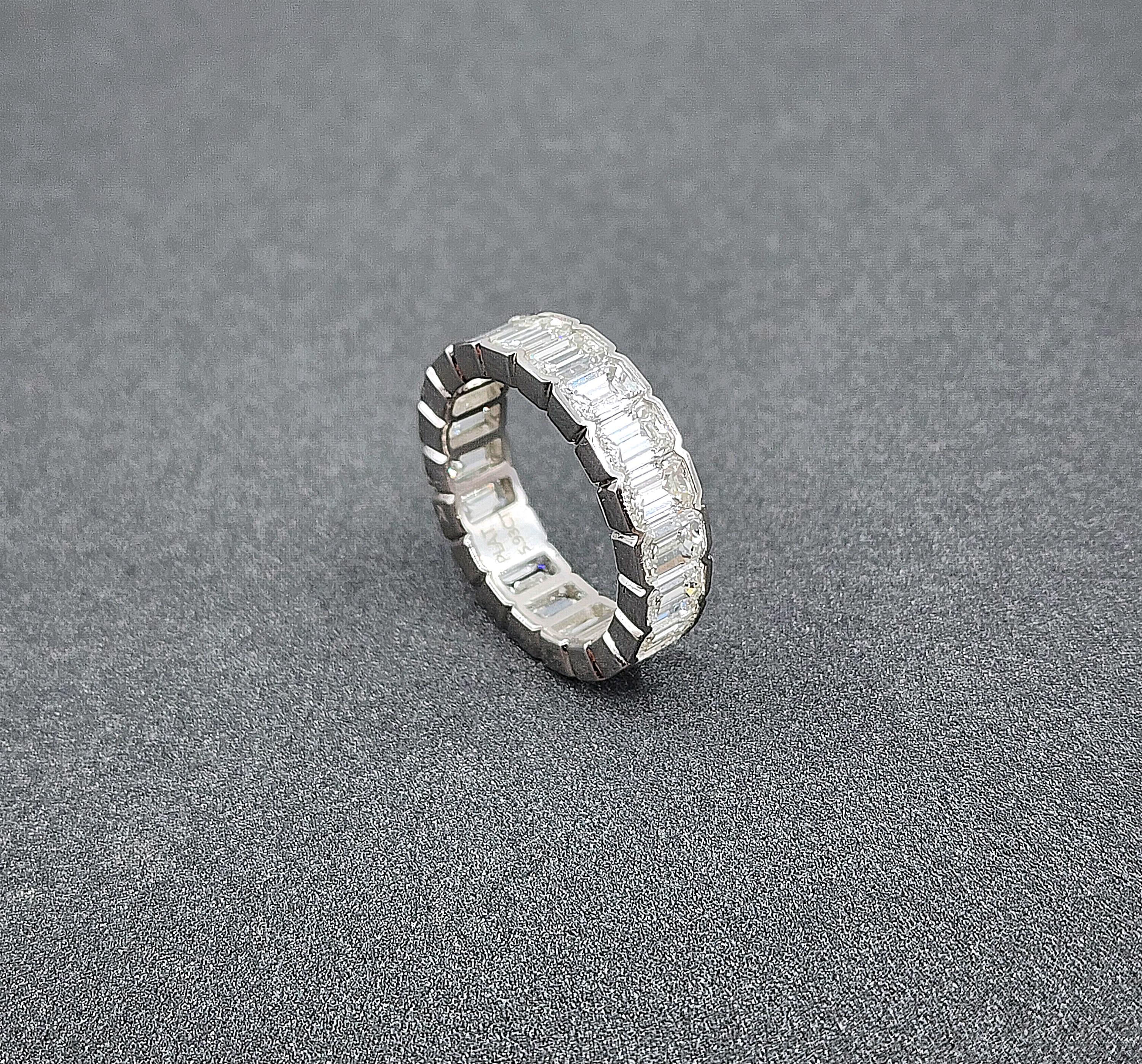 Modern 5.93 ct Bezel Set Emerald Cut Eternity Ring For Sale
