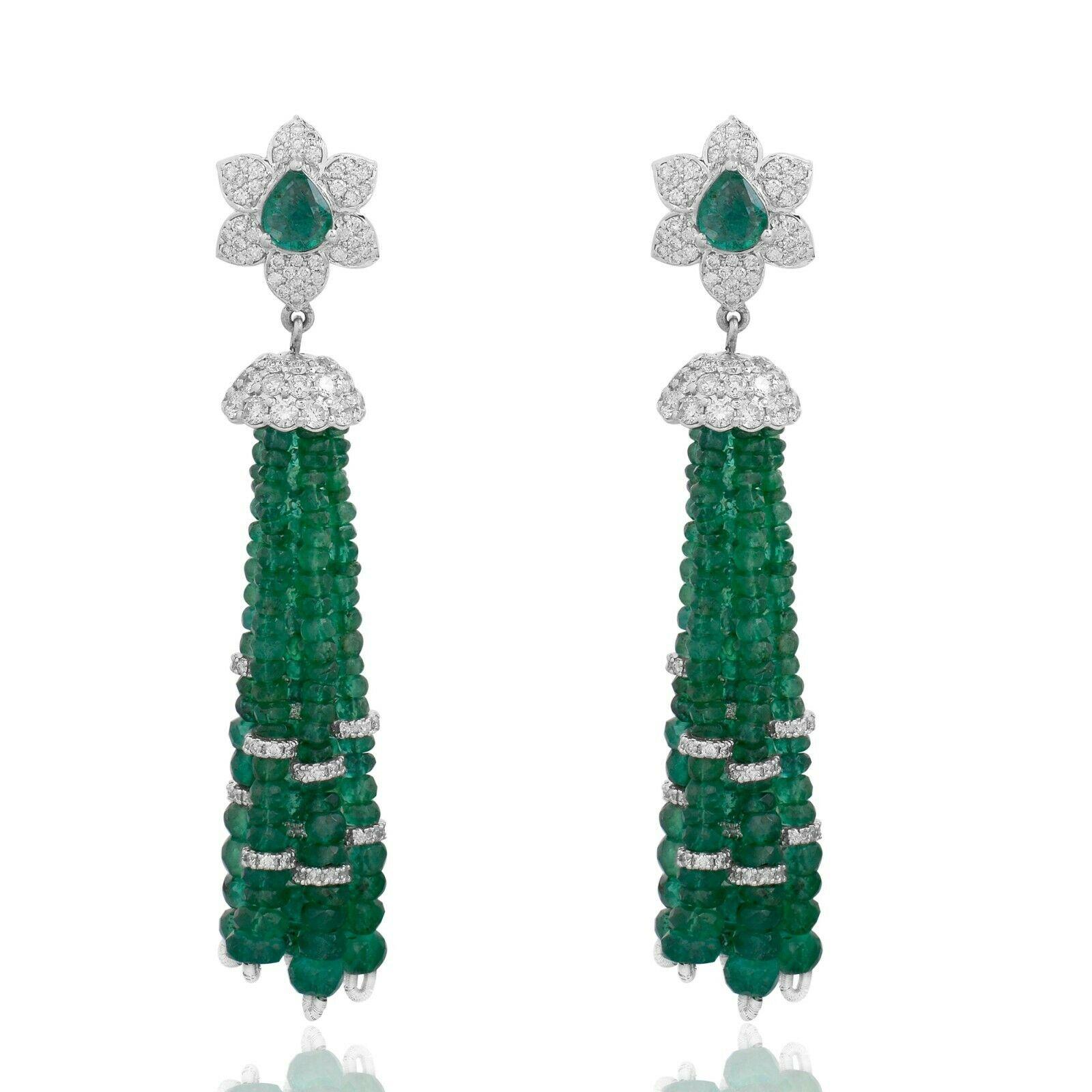 These stunning tassel earrings are handmade in 14-karat gold.  It is set with 59.35 carats emerald and 2.50 carats of glittering diamonds.

FOLLOW  MEGHNA JEWELS storefront to view the latest collection & exclusive pieces.  Meghna Jewels is proudly