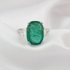 Exceptional 5.94-Carat Emerald and Diamond Three-Stone Ring