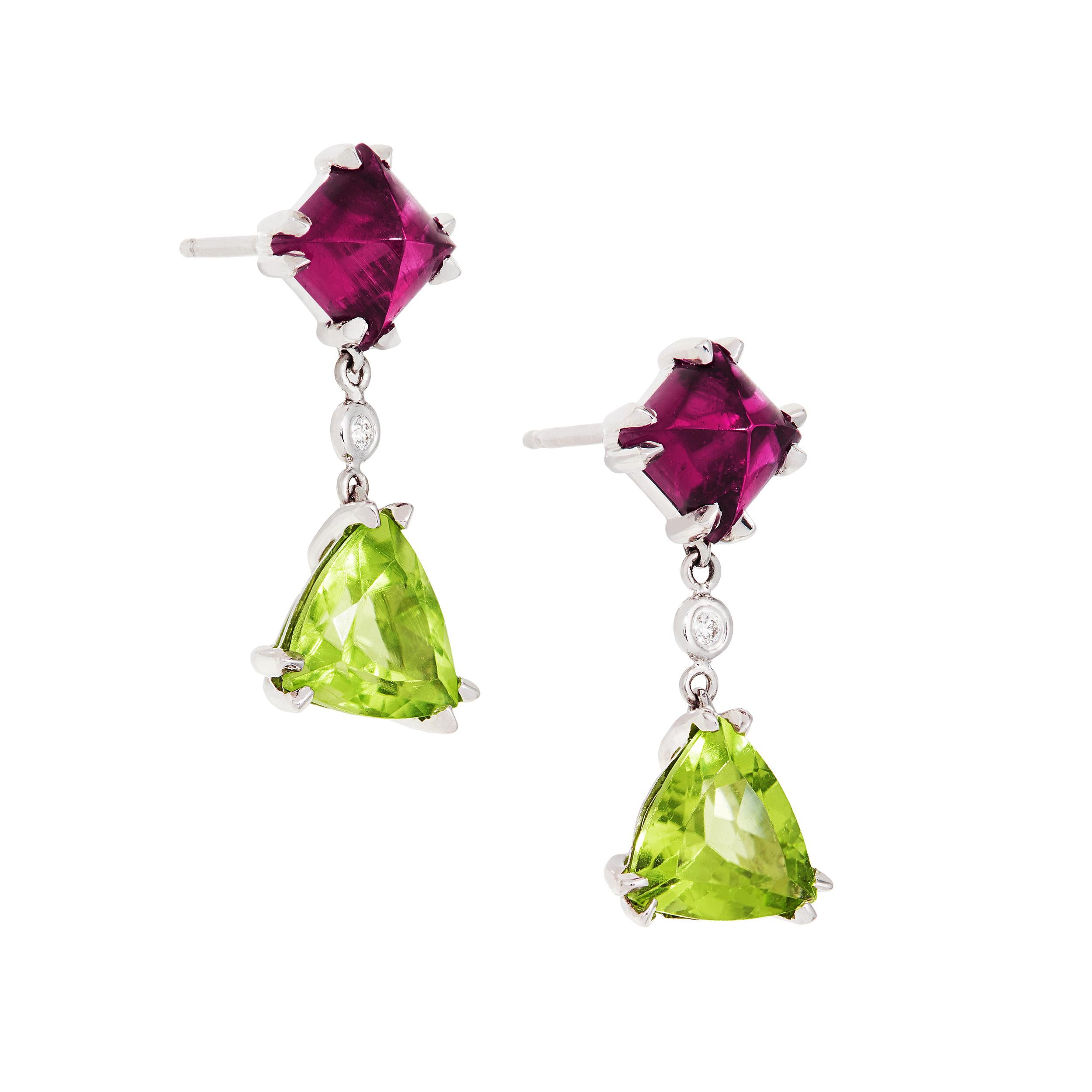 The play of color between the Sugarloaf Cut Rubellite Tourmaline and Peridot are reminiscent of a sweet shop with their vibrance and frivolity. Part of a one of a kind Kiersten Elizabeth set where comfort and versatility are paramount.

These