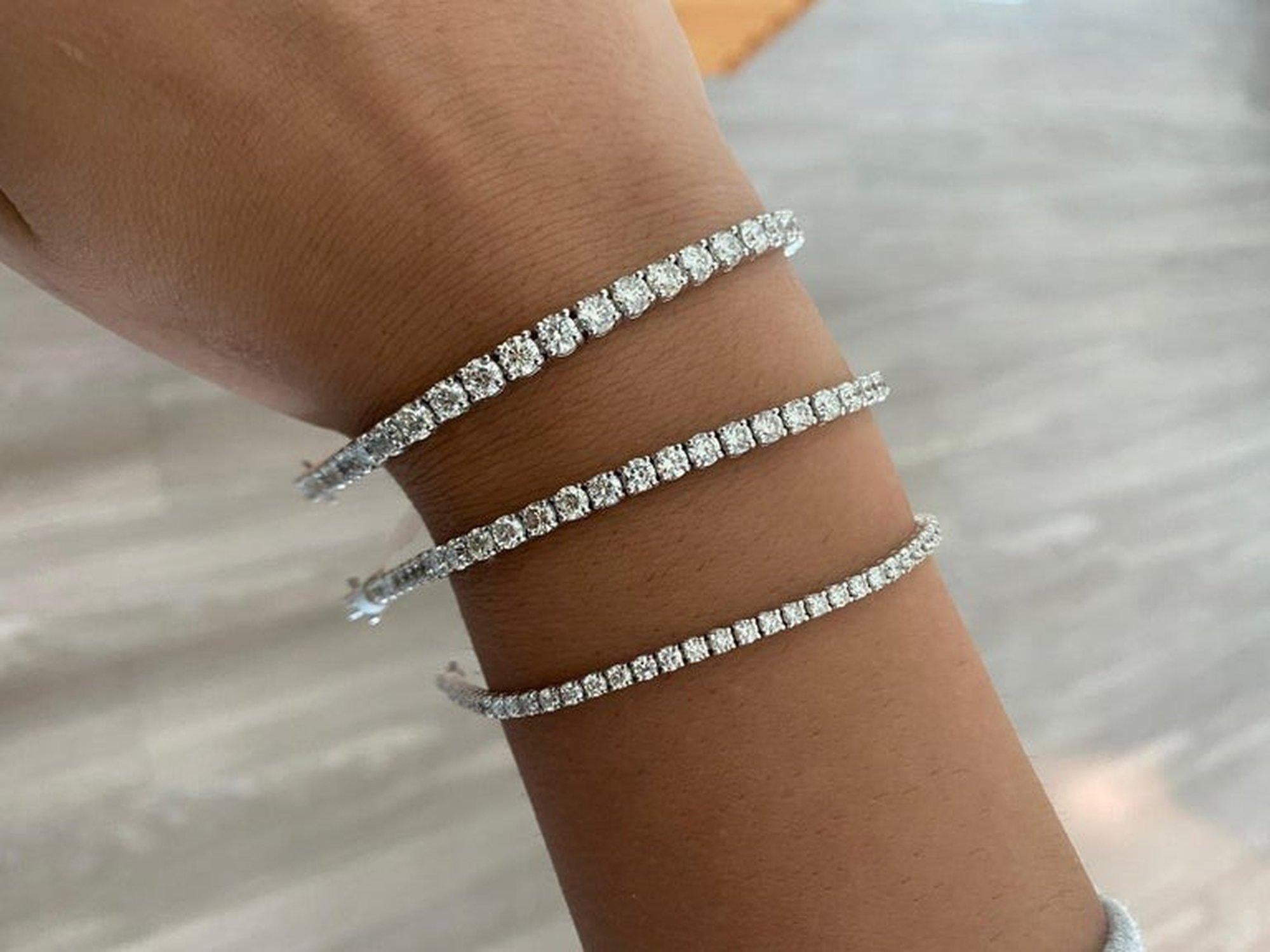 This Classic Diamond Tennis Bracelet is beautifully set in a 4-Prong Setting. The round diamond tennis bracelet is one of our customer's favorites. Its simplicity is what makes it so popular and easy to match and stack with any other