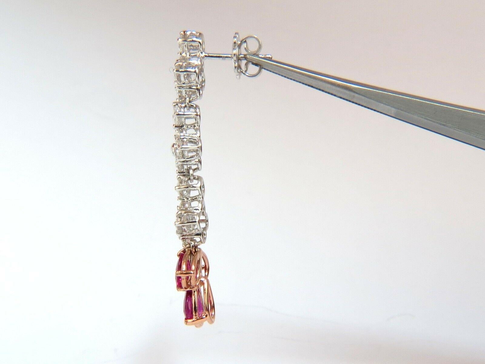 Diamond Custer Dangles & No heat Rubies (6)

3.14ct. Natural Vivid Red Rubies

6.3 X 4.5mm (average)

Full cut Pear brilliants.

Excellent, clean clarity & transparent

The Fine Pigeon Blood. 



2.80ct. round, full cut diamonds.

G-color Vs-2