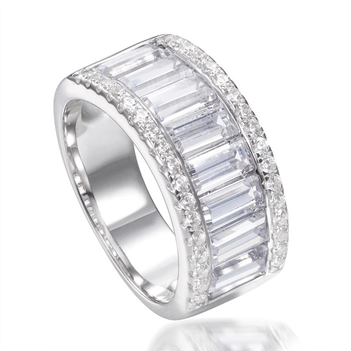 This exceptionally crafted channel set half eternity ring radiates brilliance. 

Centrally set with a row of 5.59 carat baguette cut cubic zirconia and accented by two rows of the highest quality brilliant cut cubics, this ring is a real
