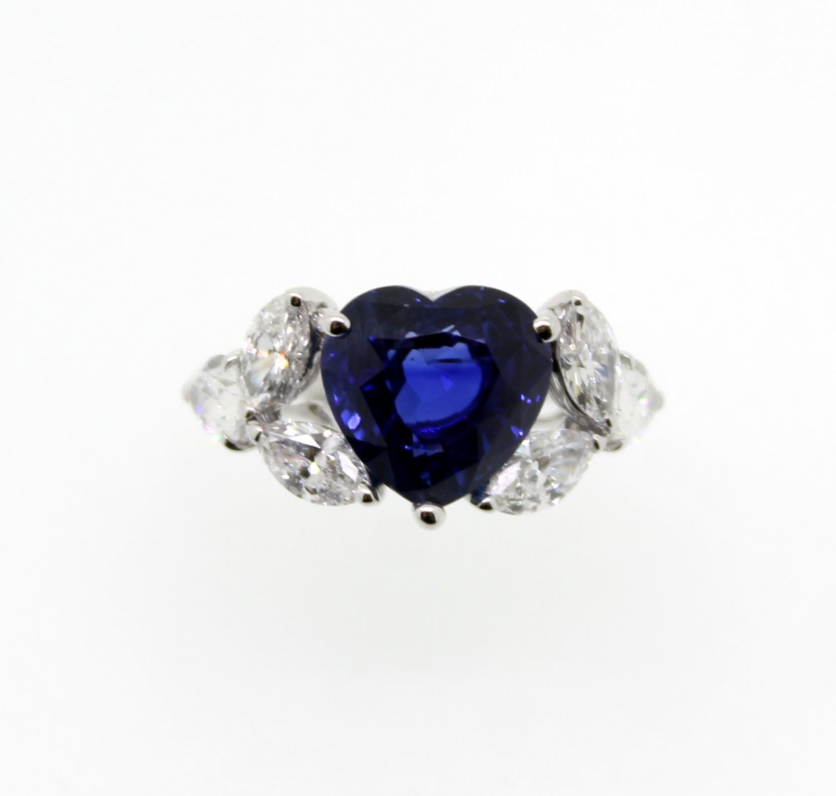 Contemporary 5.95 Carat Heart Shape Sapphire and White Marquise Diamond Cocktail Ring For Sale