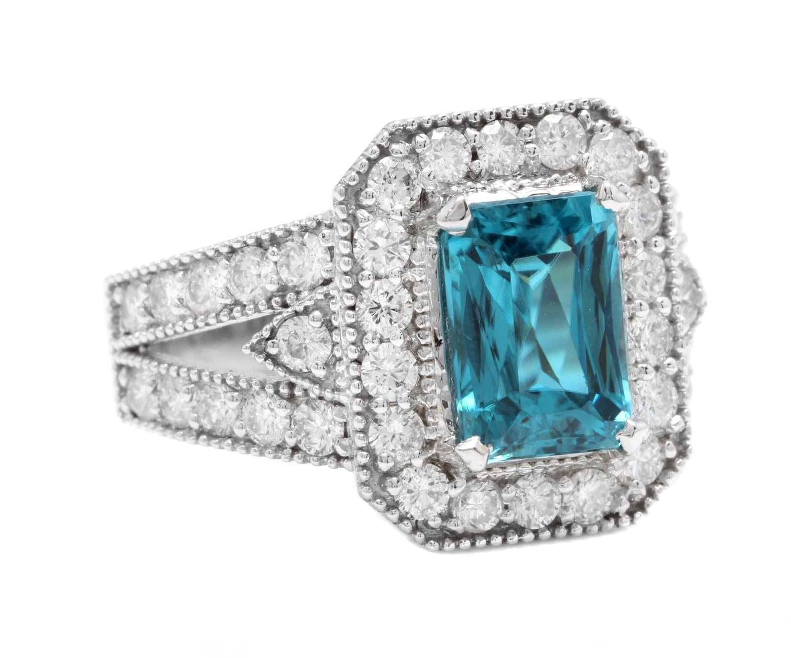 5.95 Carats Natural Very Nice Looking Blue Zircon and Diamond 14K Solid White Gold Ring

Suggested Replacement Value: $6,500.00

Total Natural Oval Cut Blue Zircon Weight is: Approx. 4.50 Carats 

Natural Round Diamonds Weight: Approx. 1.45 Carats