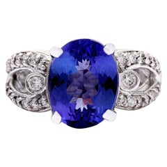 Bague en or blanc massif 14 carats avec tanzanite naturelle et diamant 