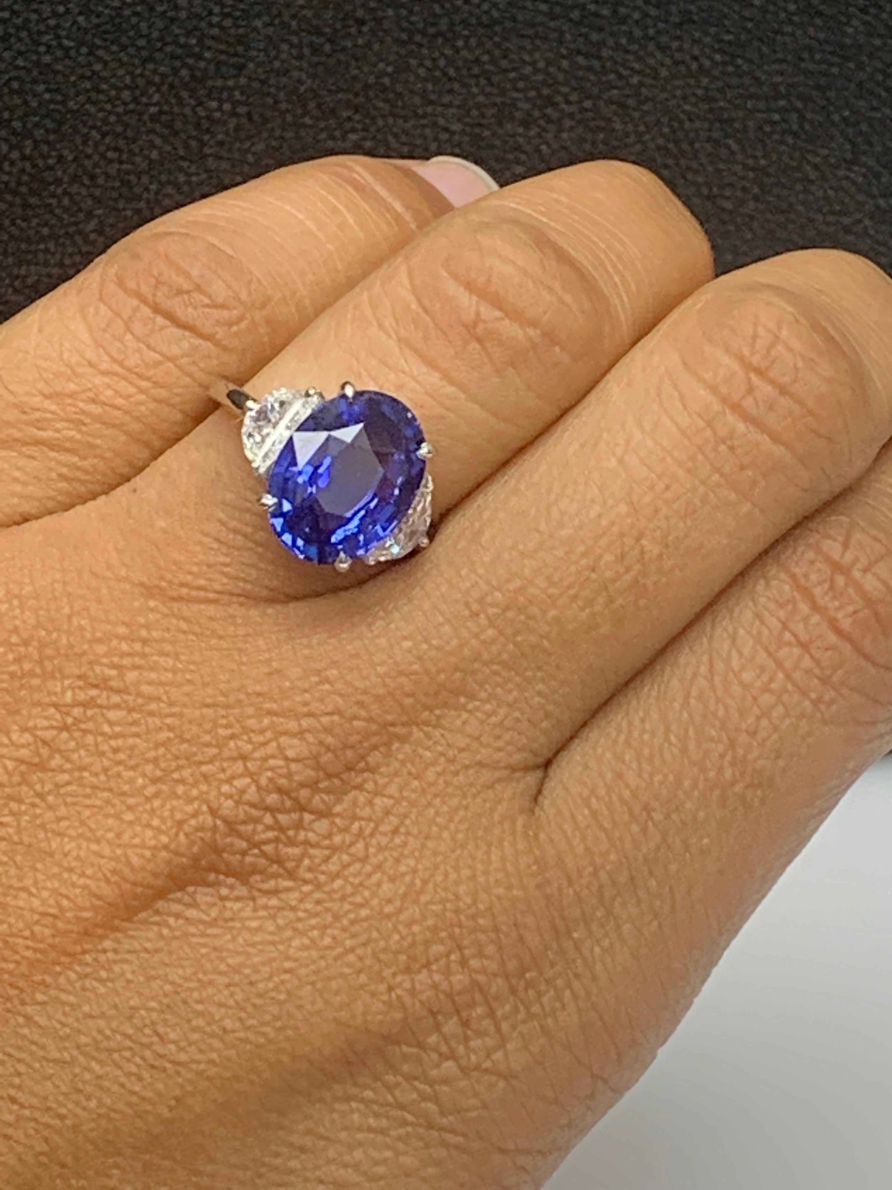 5.96 Carat Oval Blue Sapphire Diamond Three-Stone Engagement Ring in Platinum For Sale 12