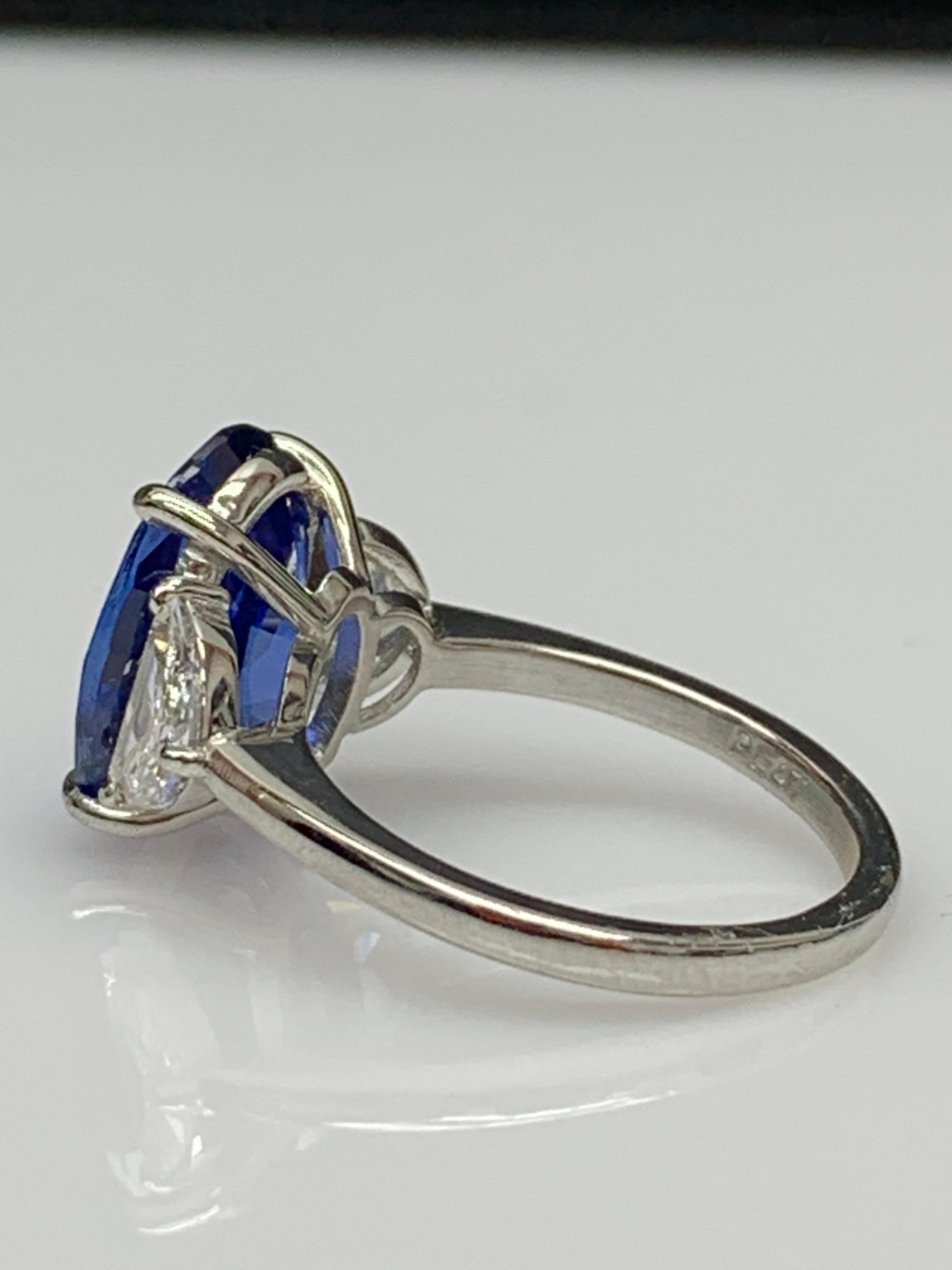 5.96 Carat Oval Blue Sapphire Diamond Three-Stone Engagement Ring in Platinum In New Condition For Sale In NEW YORK, NY