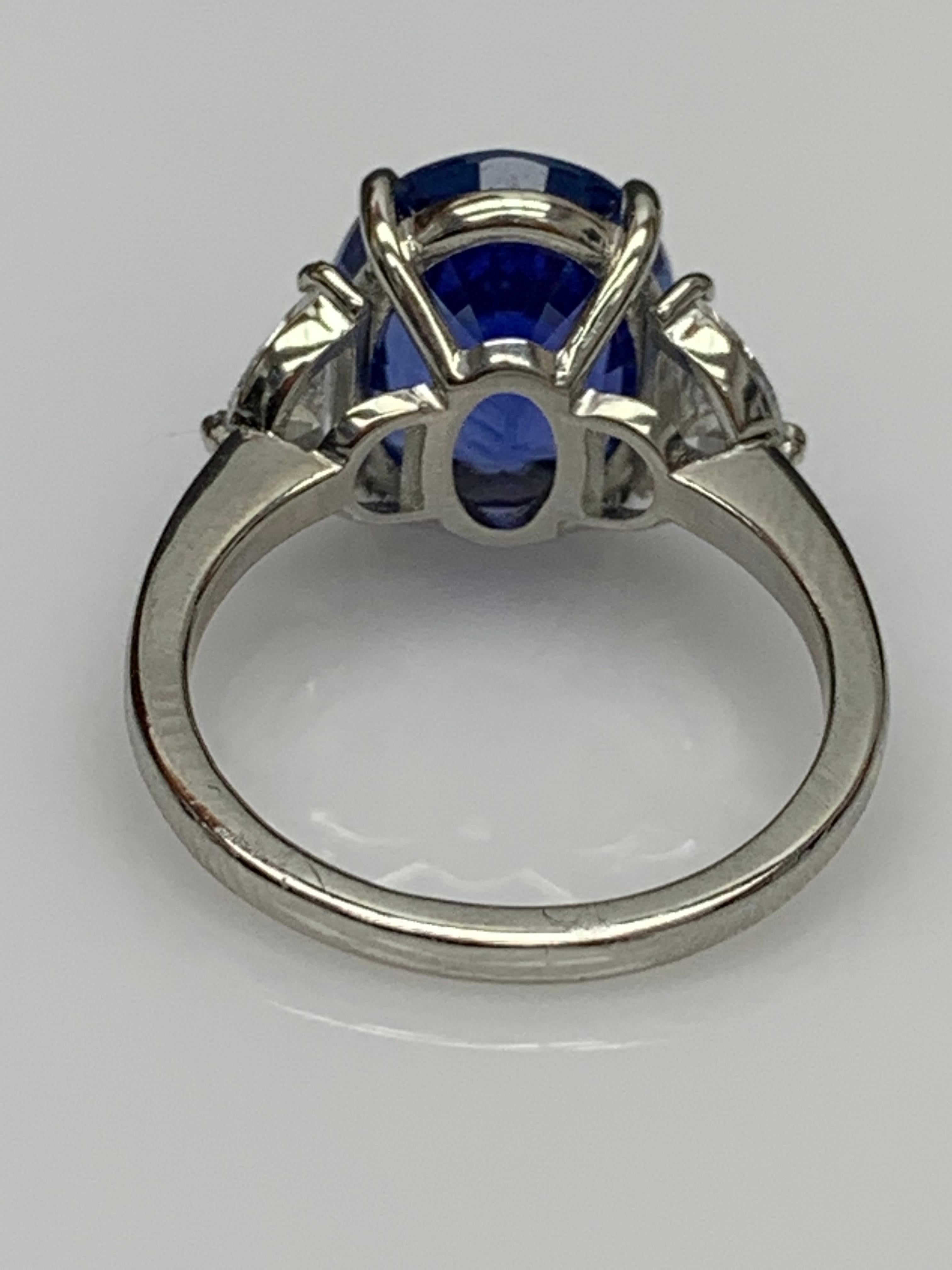 Women's 5.96 Carat Oval Blue Sapphire Diamond Three-Stone Engagement Ring in Platinum For Sale